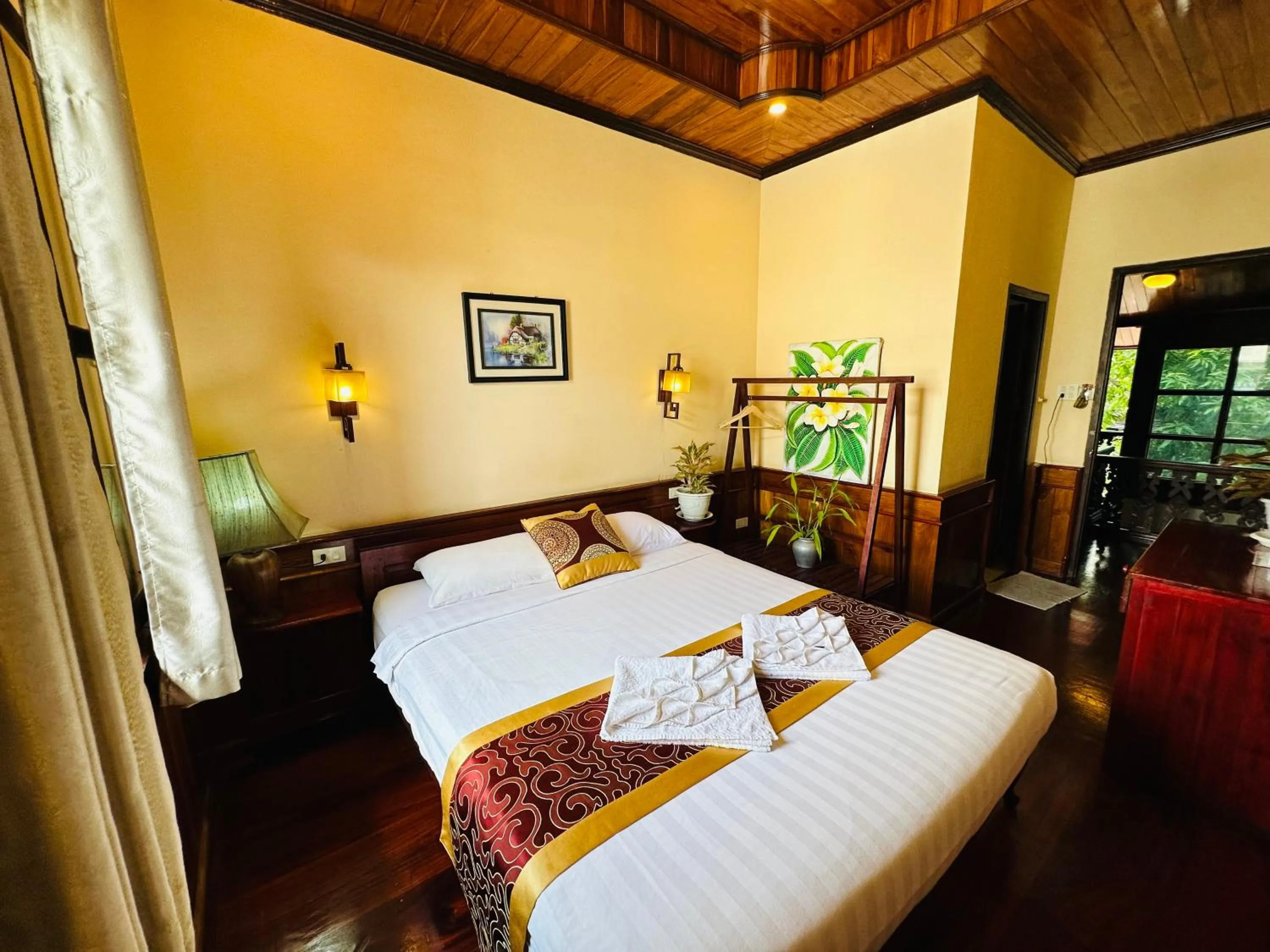 Bed in Ammata Boutique Villa