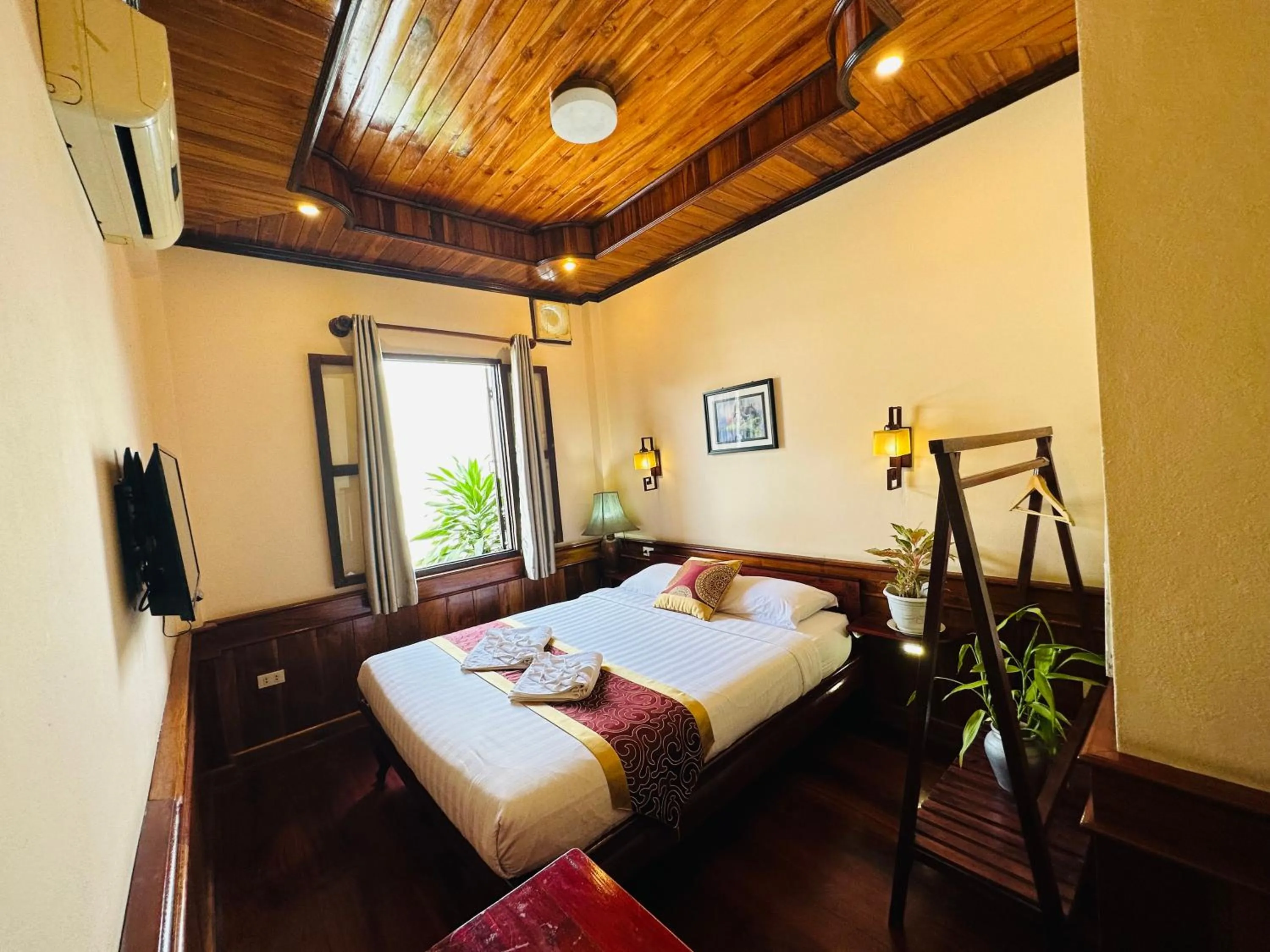 Bed in Ammata Boutique Villa