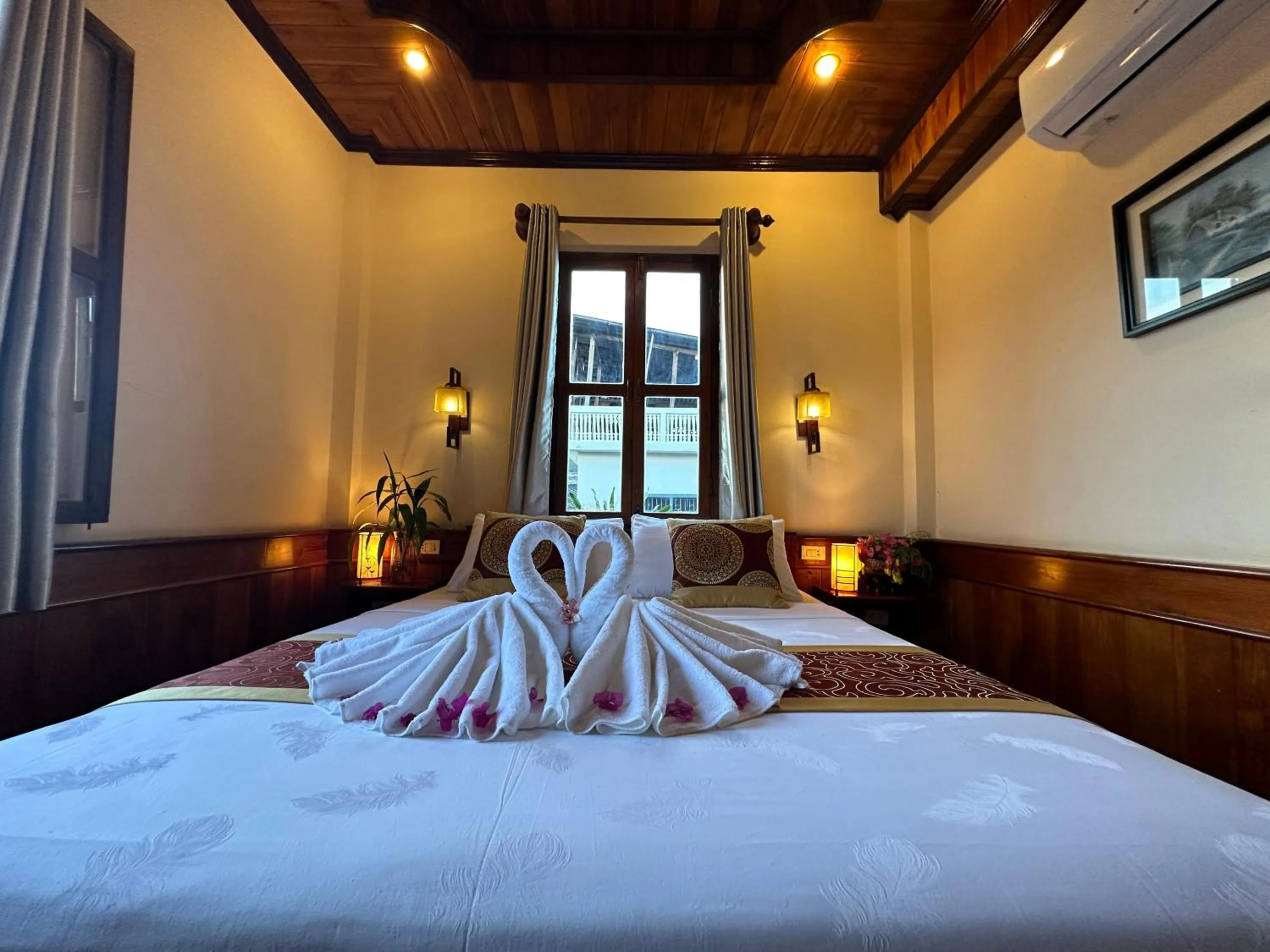 Bed in Ammata Boutique Villa