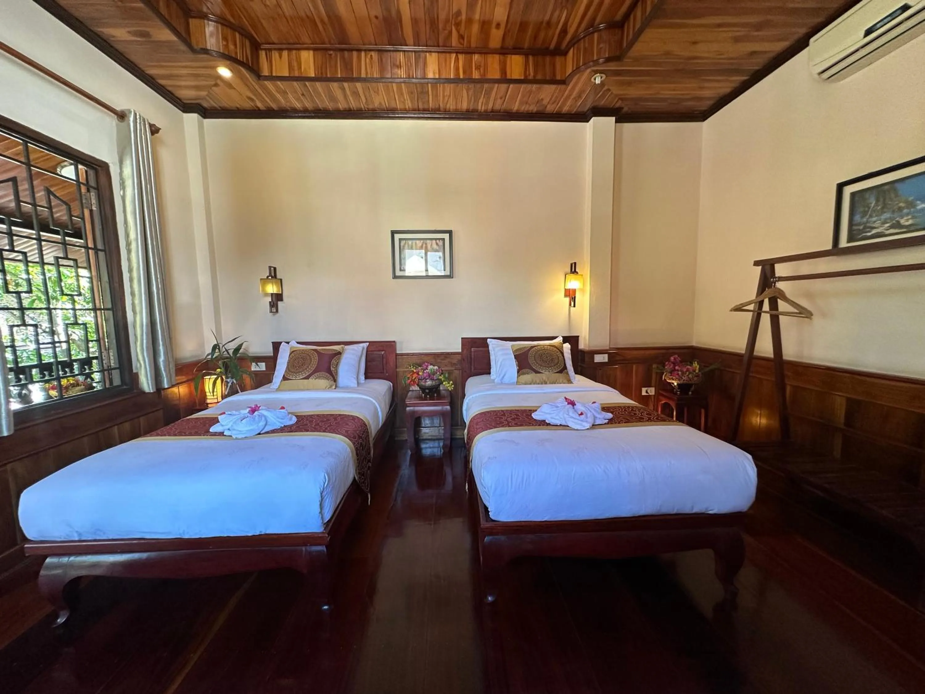Bed in Ammata Boutique Villa