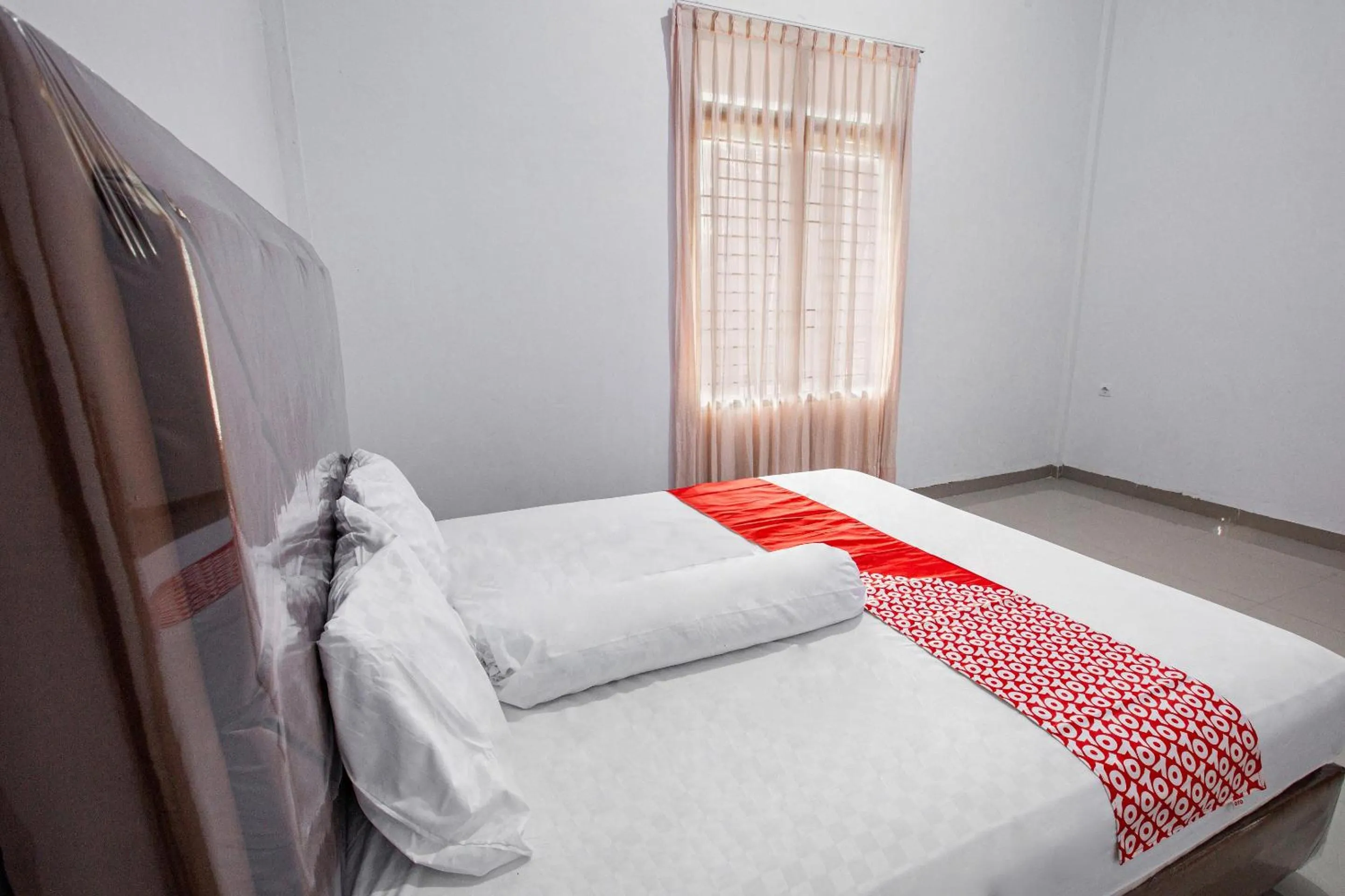 Bedroom, Bed in Hotel O Homestay Romauli Kampung Radja