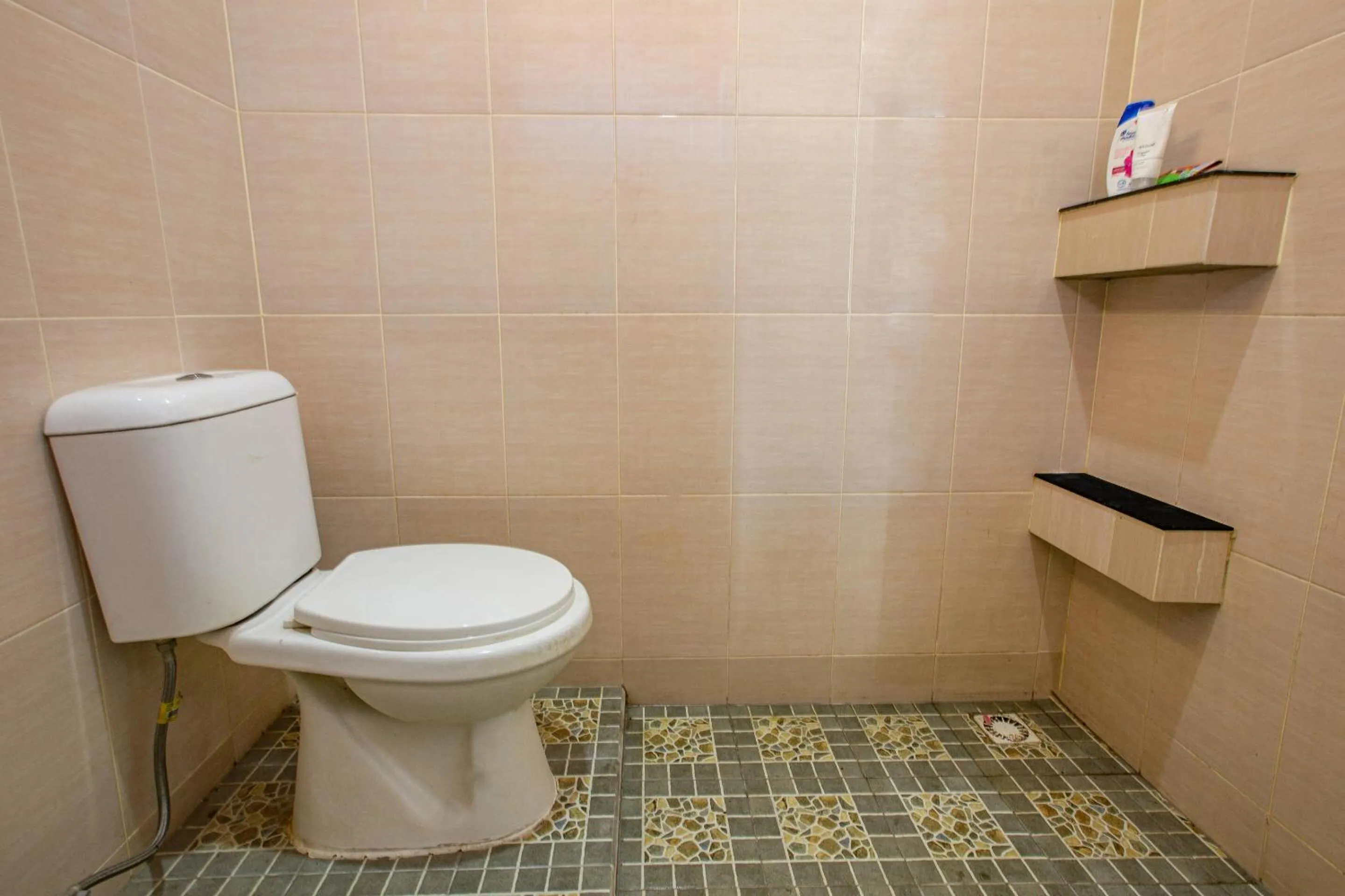 Bedroom in Hotel O Homestay Romauli Kampung Radja