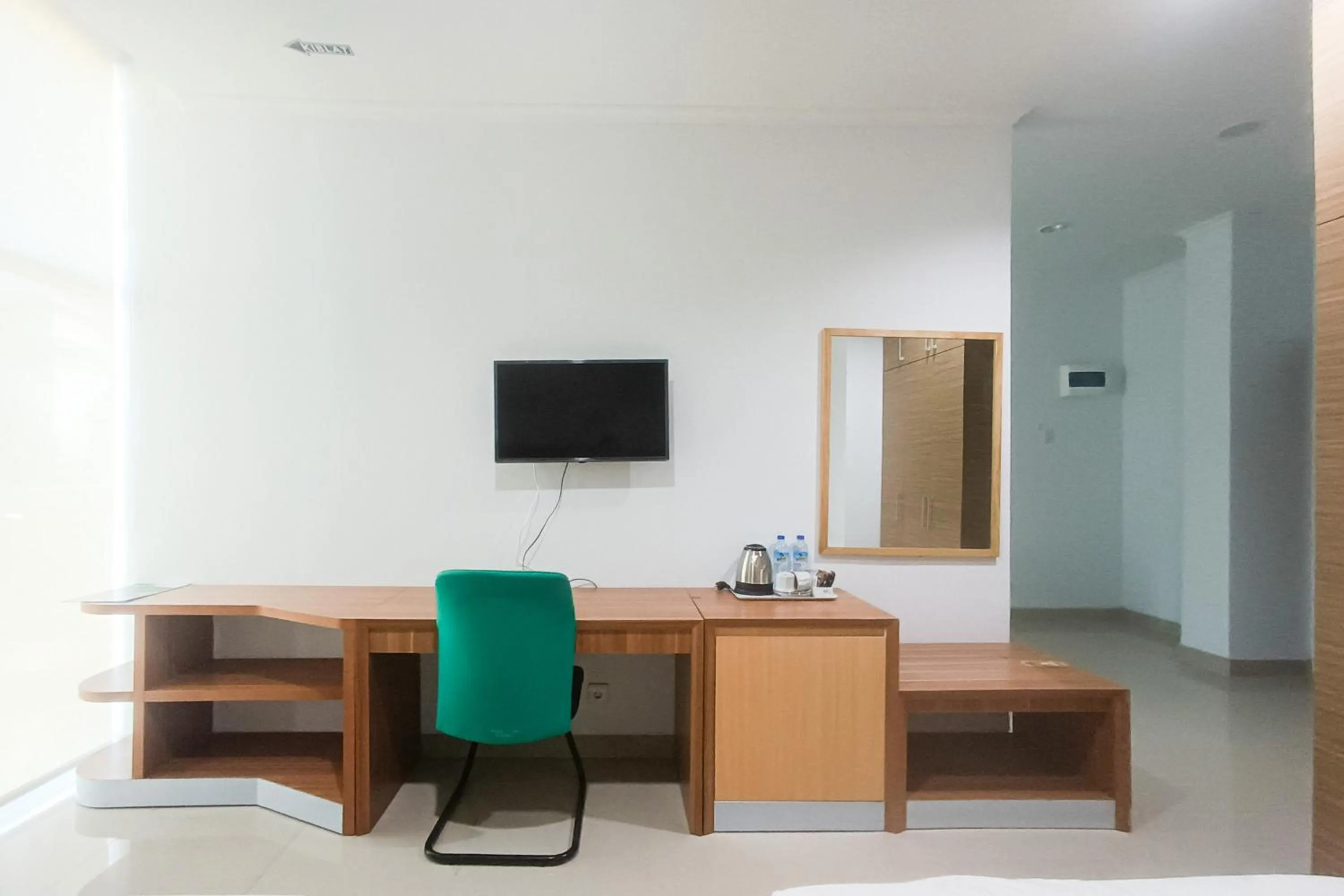 Seating area in Urbanview Hotel Syariah UIN Mataram