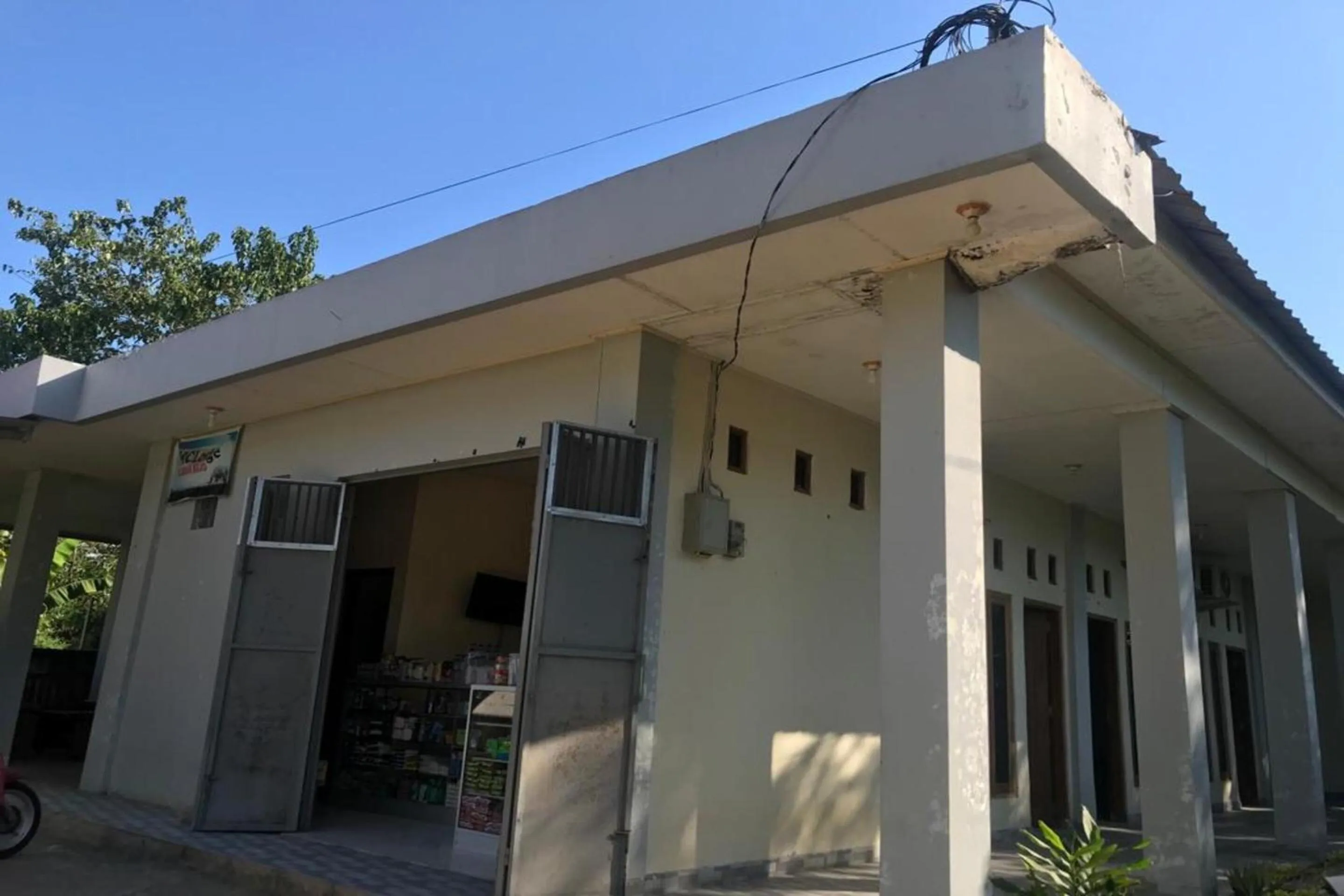 Facade/entrance in Hotel O Penginapan Mc Lodge