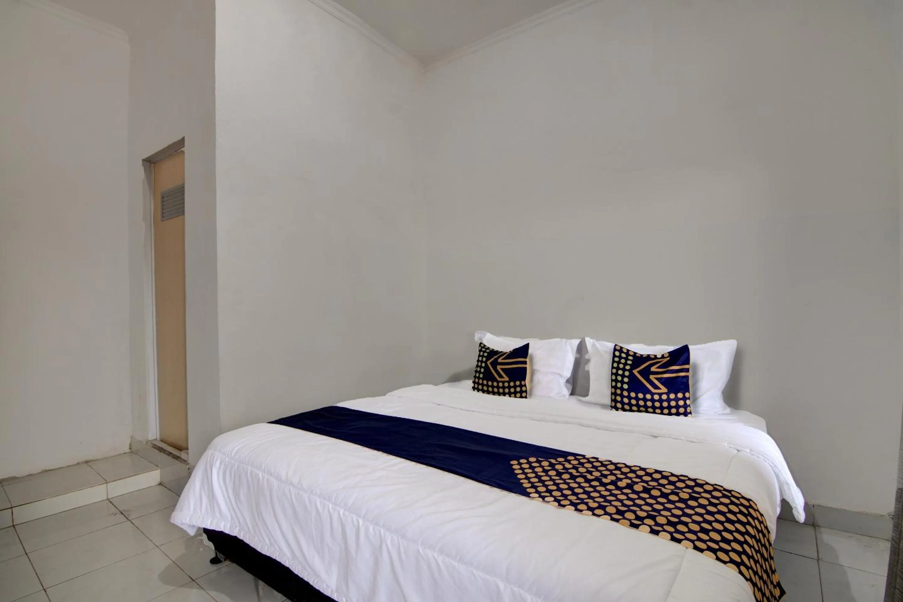 Bedroom, Bed in Hotel O Homestay Baiturrahmah Syariah