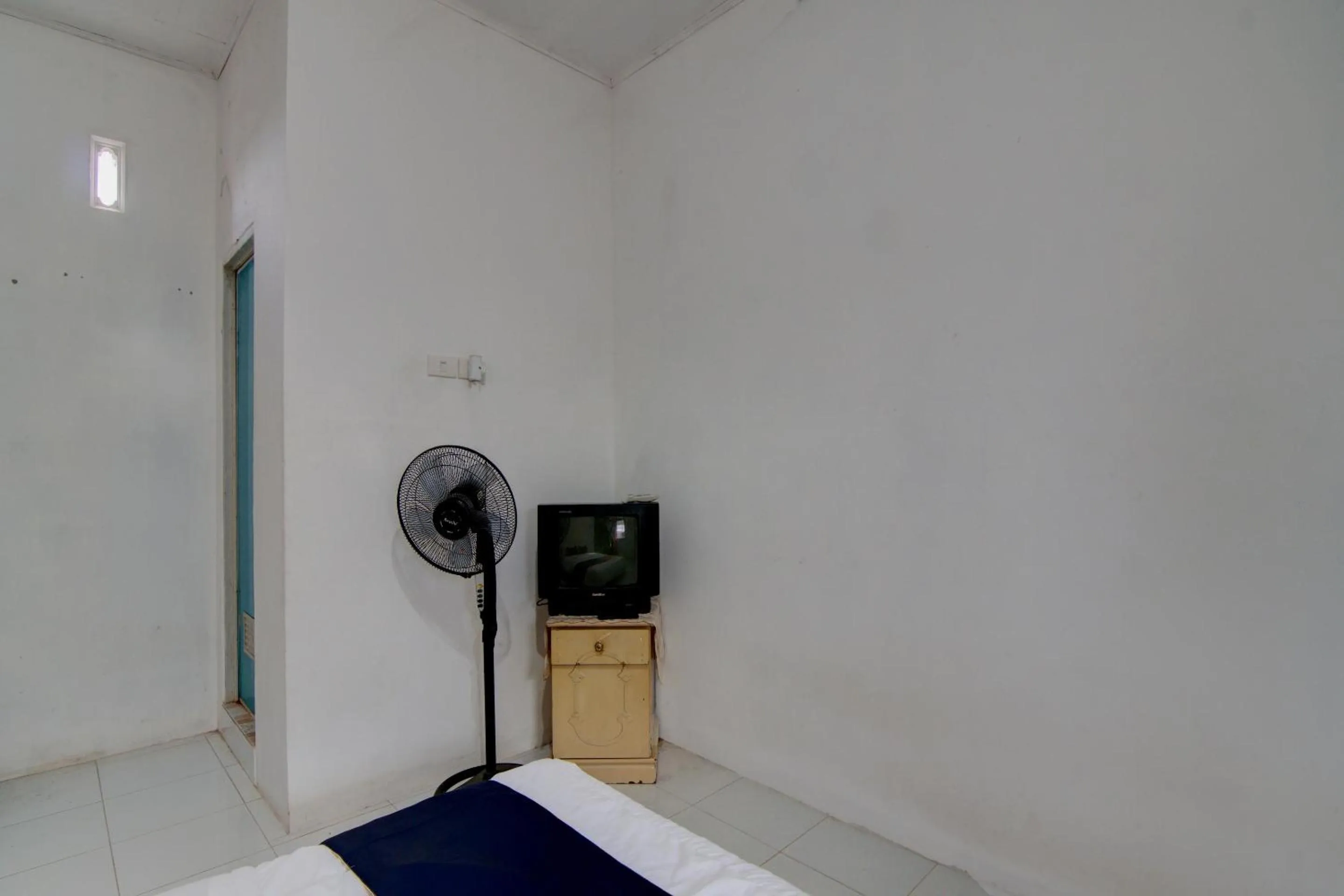 Bedroom in Hotel O Homestay Baiturrahmah Syariah