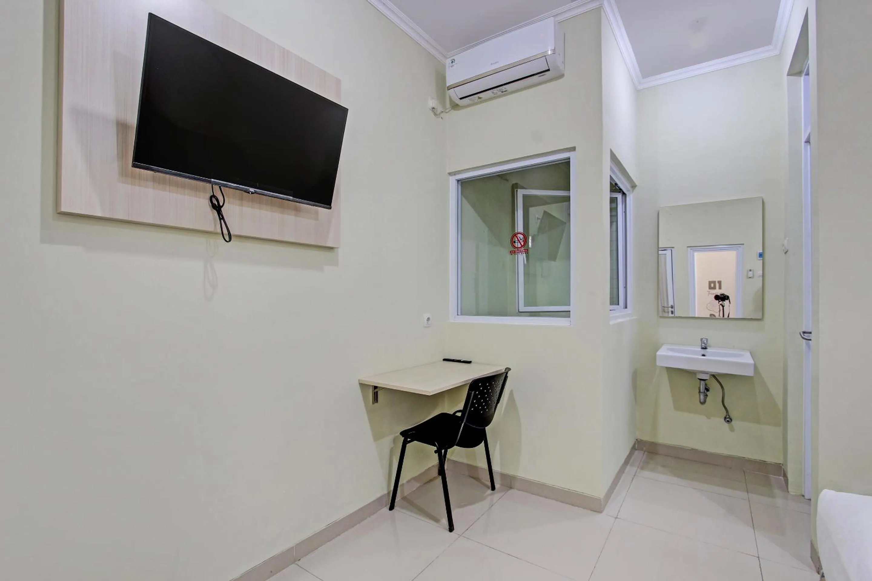 Bedroom in Hotel O Tumesa Homestay 2 Syariah