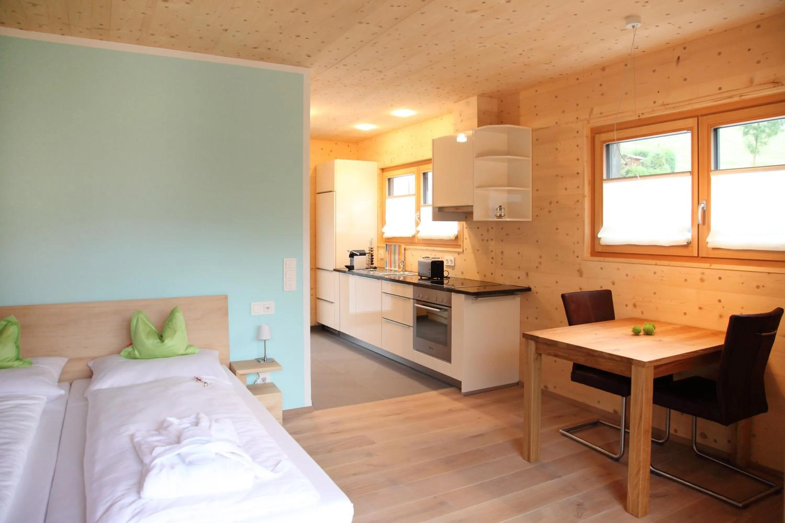 Kitchen or kitchenette, Bed in Ferienwohnung Hohe Stein I Wellnessbereich I Schwarzwald I ZeiTraum
