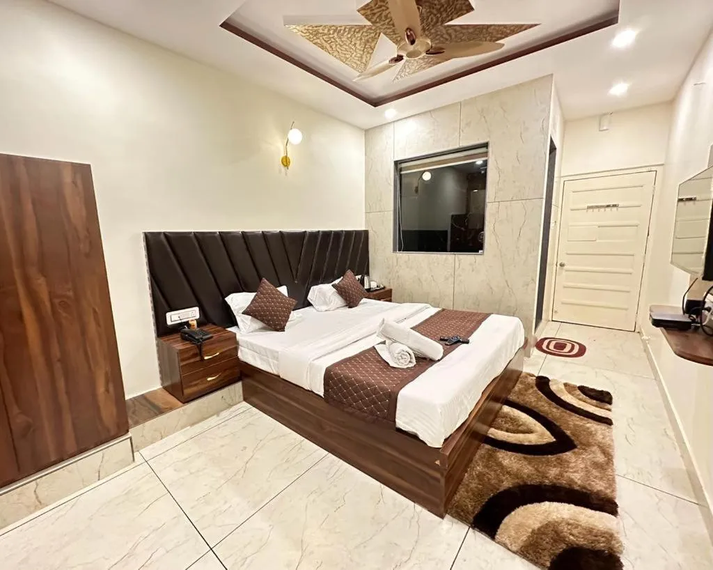 Bed in Saanjh Riverside Resort