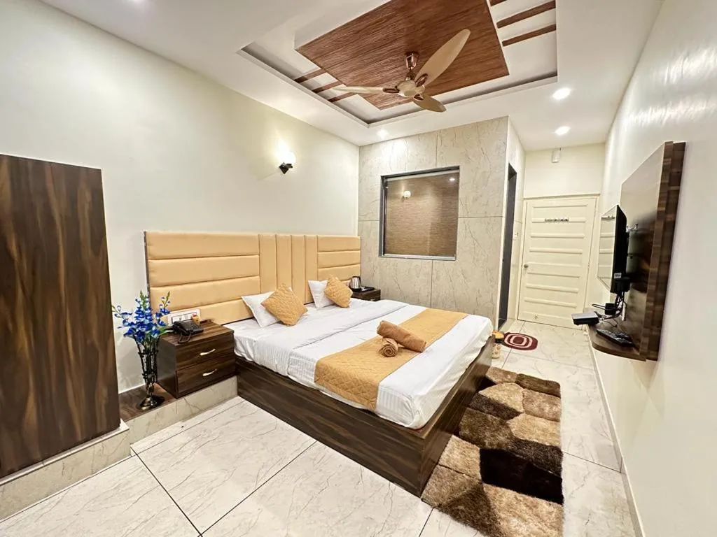 Bed in Saanjh Riverside Resort