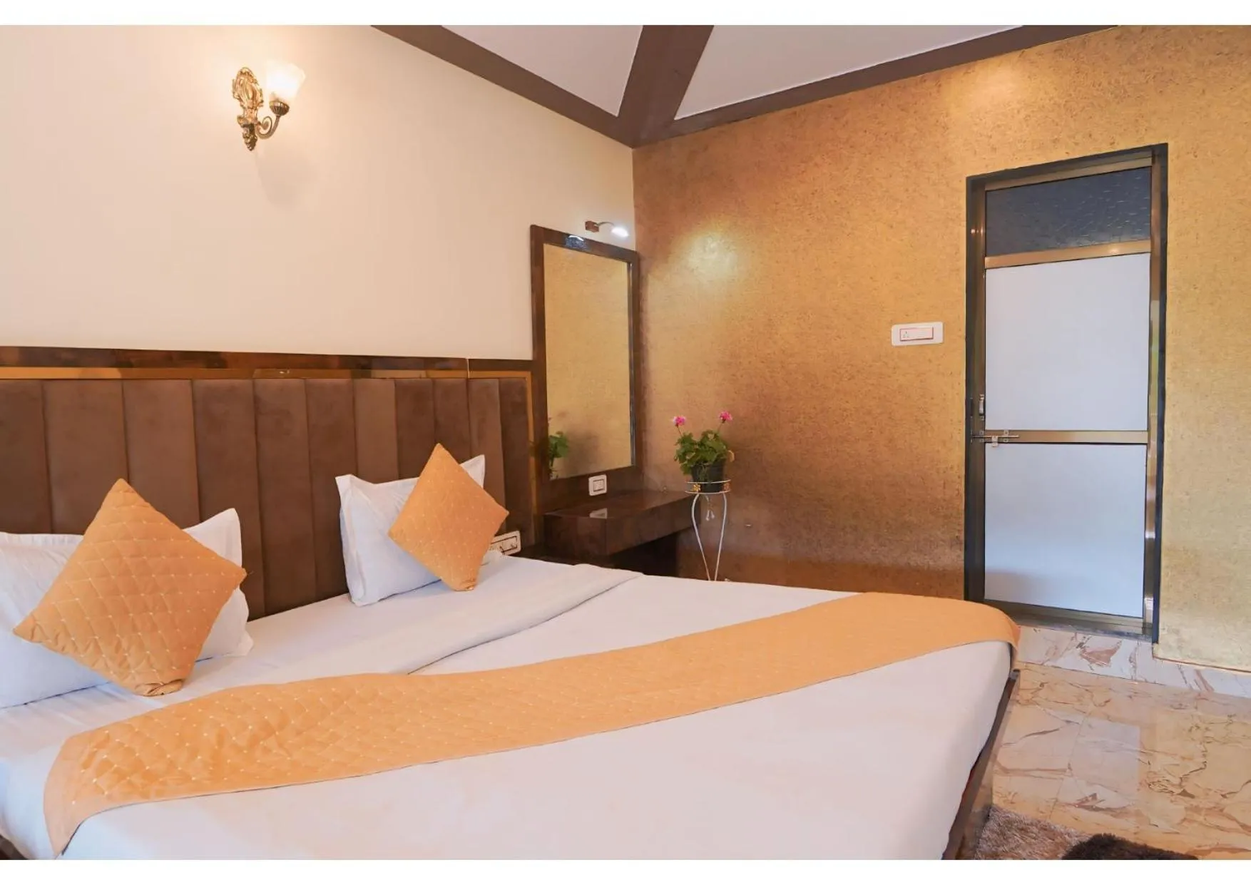 Bed in Saanjh Riverside Resort