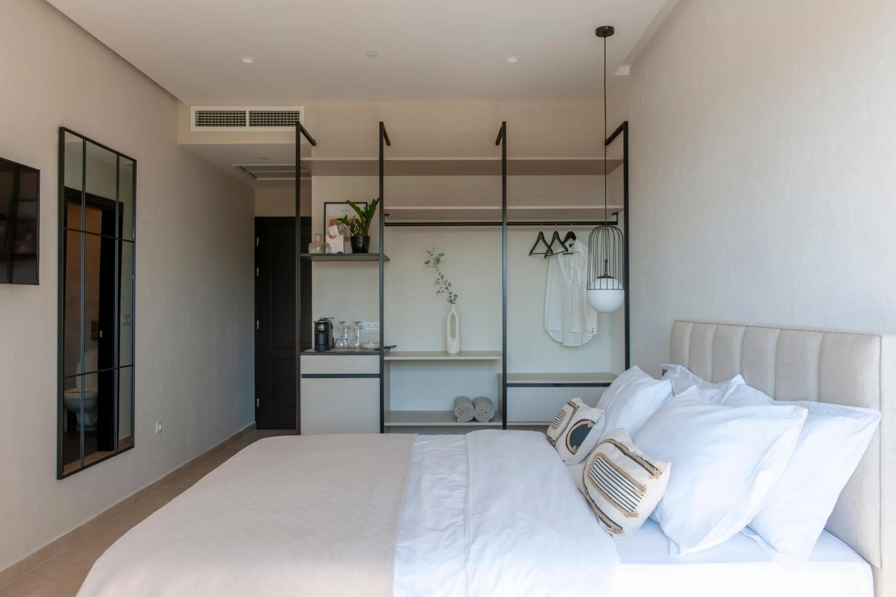 Photo of the whole room, Bed in Soho Suites