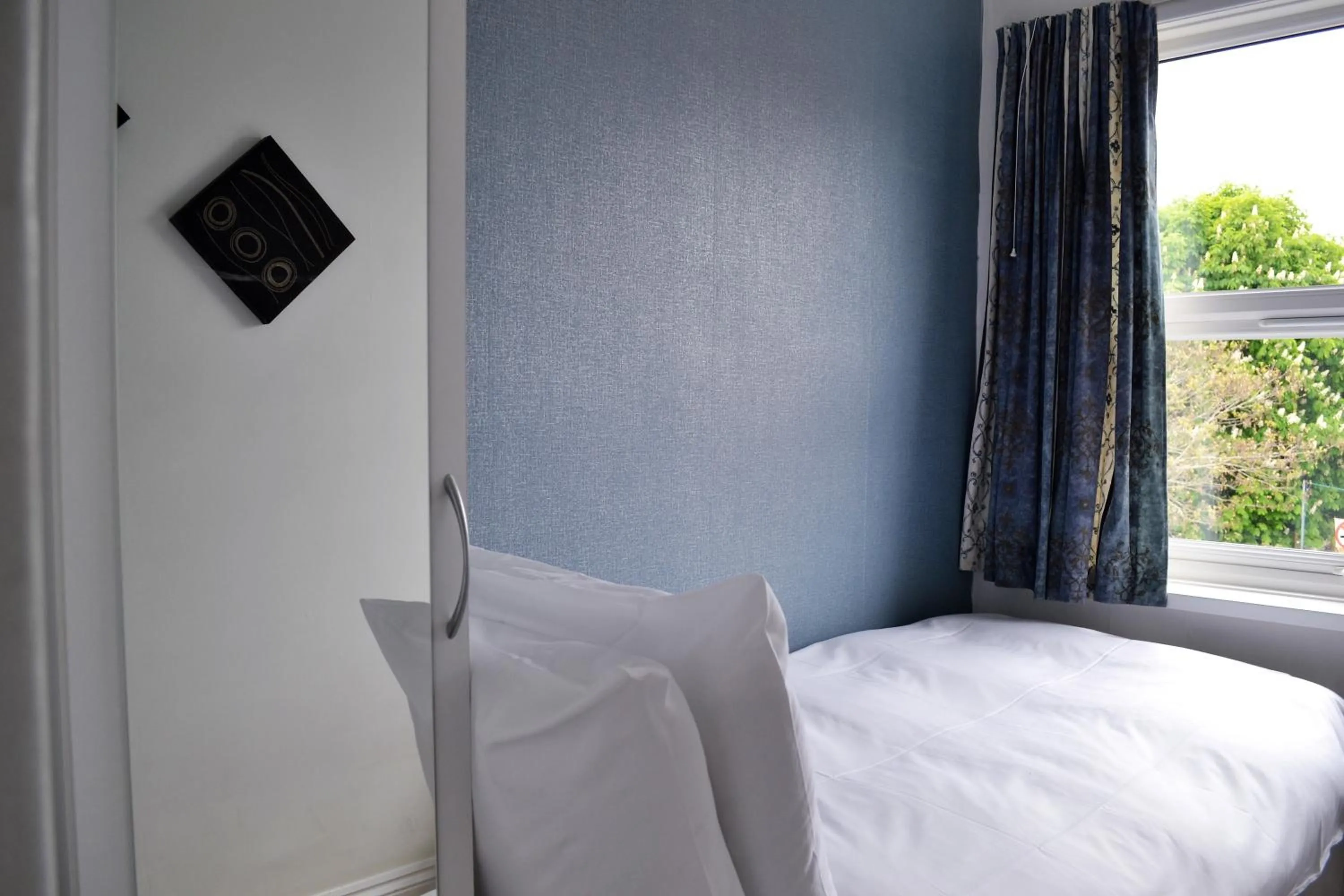 Bed in Carrington Guest House