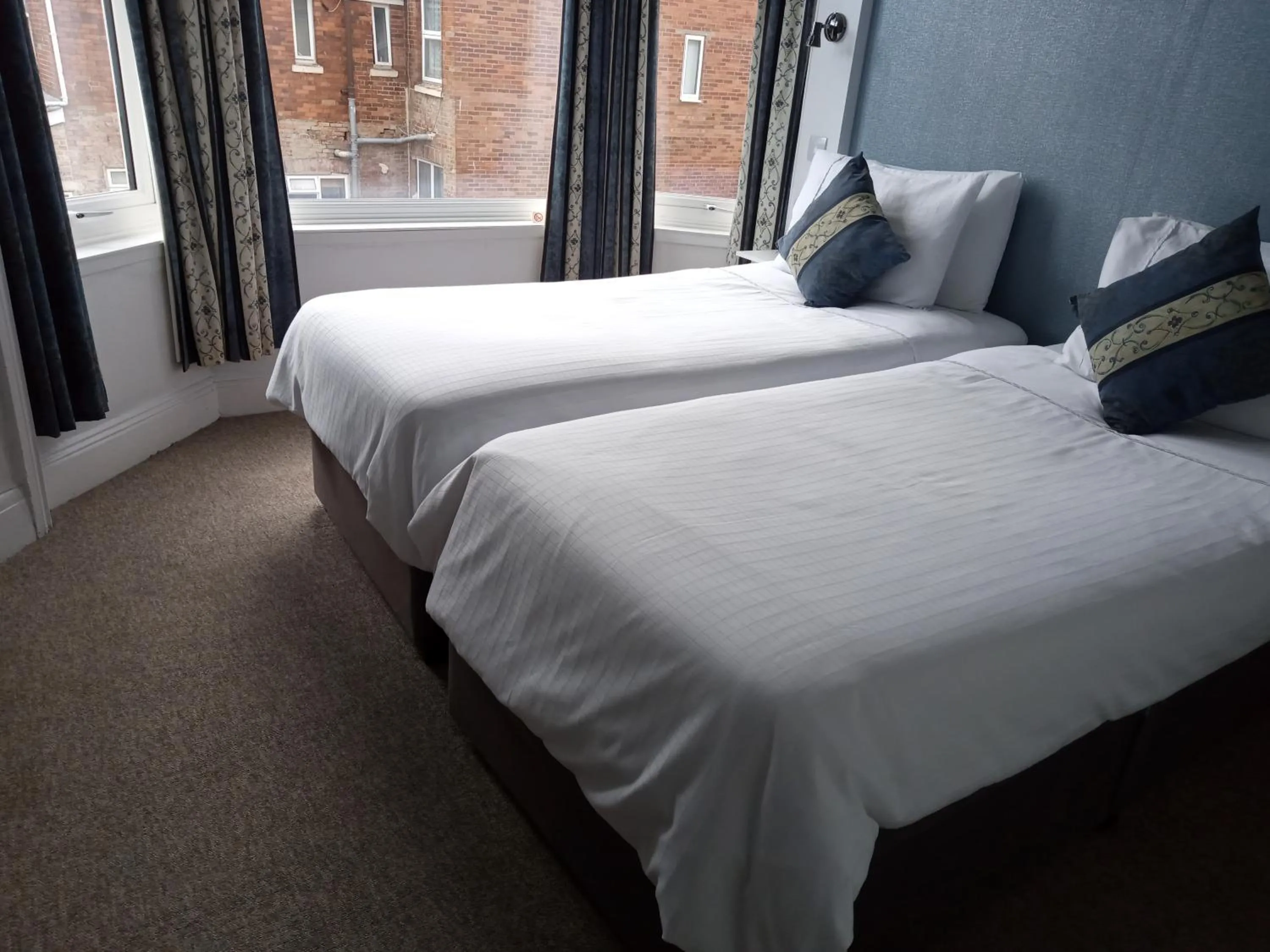 Bed in Carrington Guest House