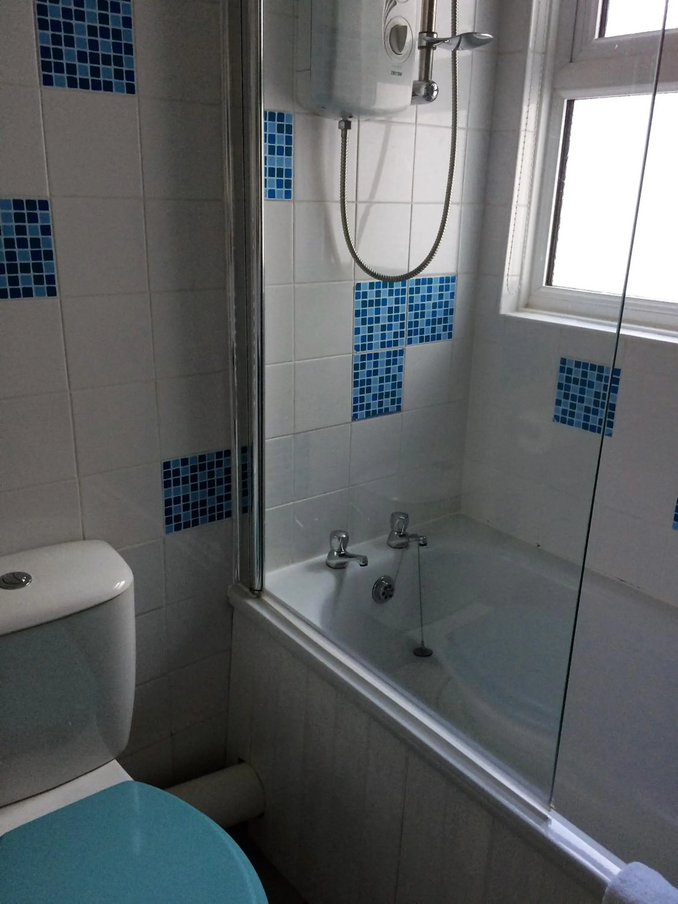 Shower in Carrington Guest House
