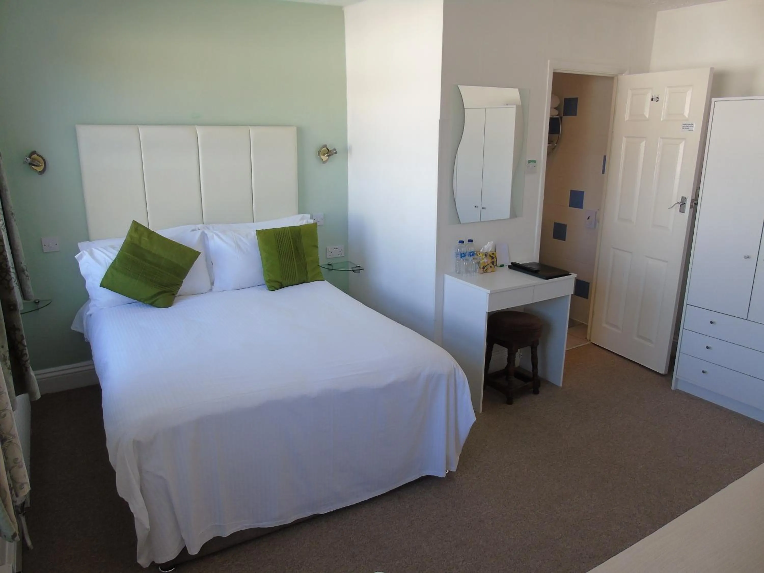 Bed in Carrington Guest House