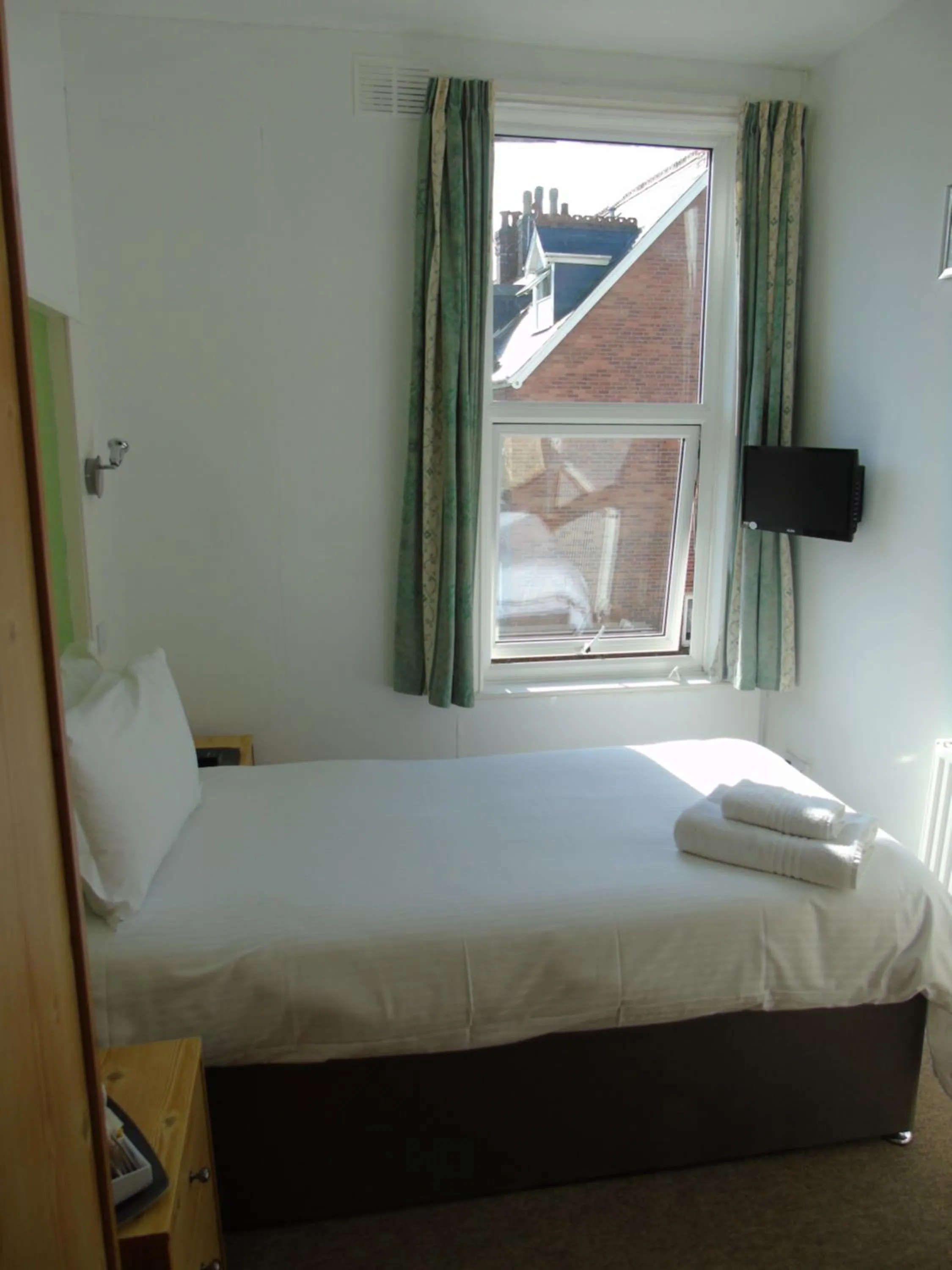 Bed in Carrington Guest House