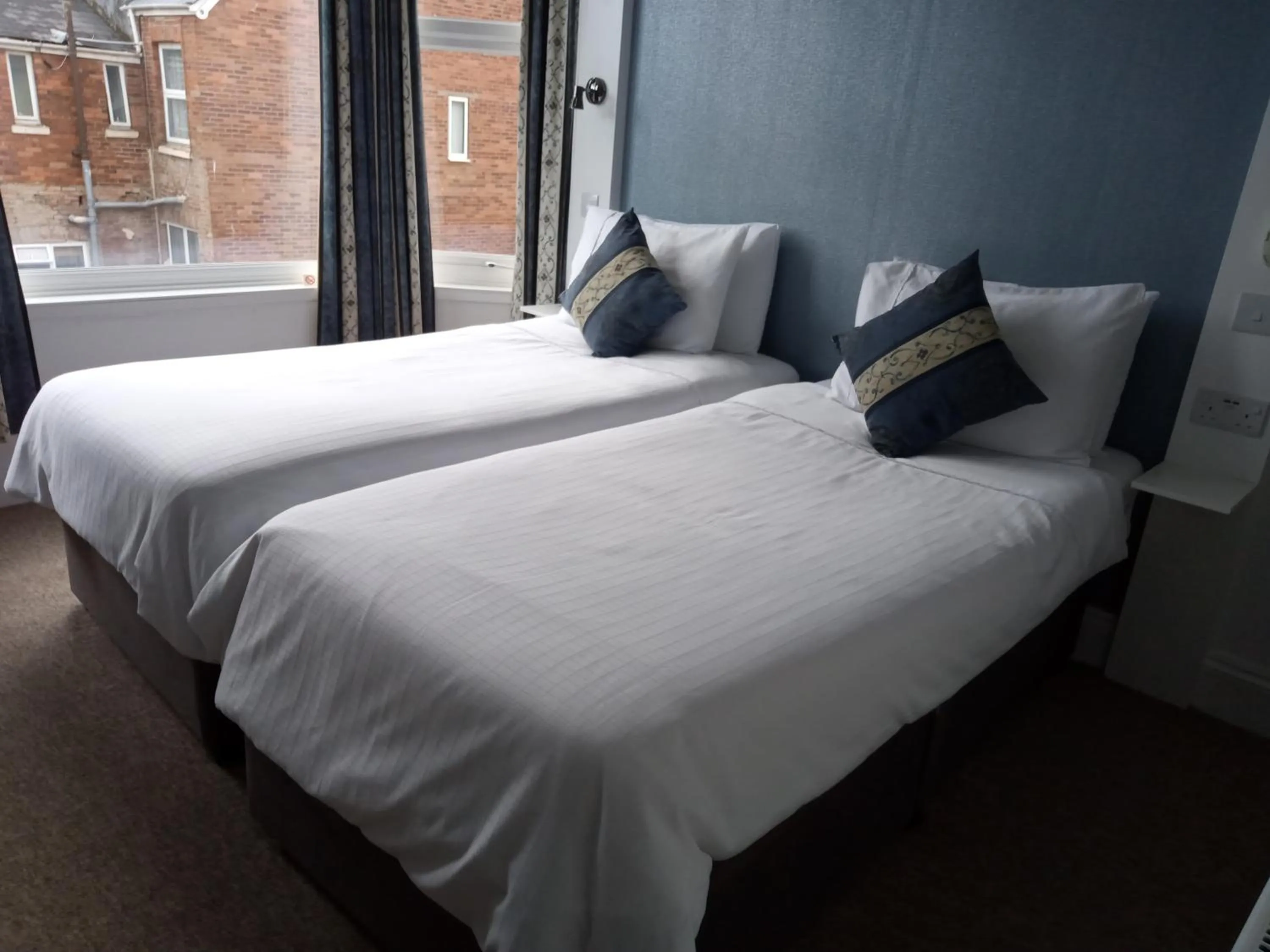 Bed in Carrington Guest House