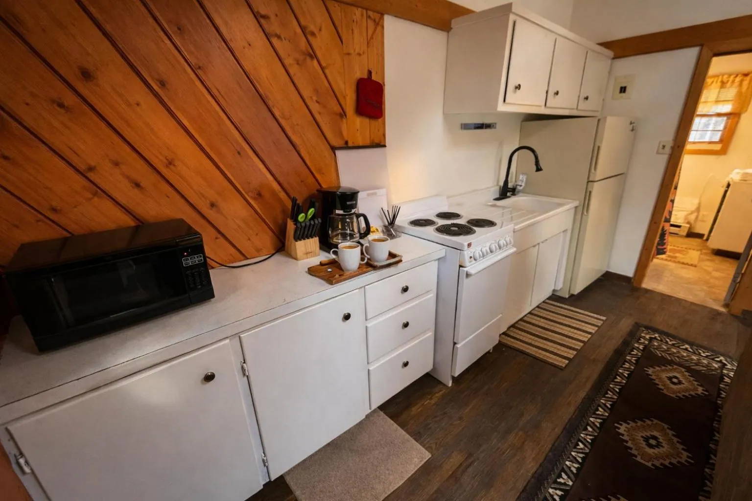 Kitchen or kitchenette in The Amoretti Hotel