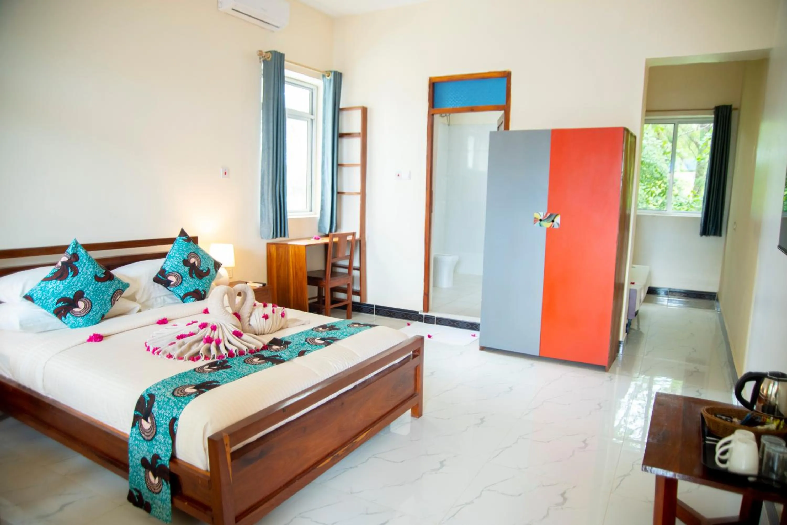 Bed in Double A Nungwi Beach Hotel