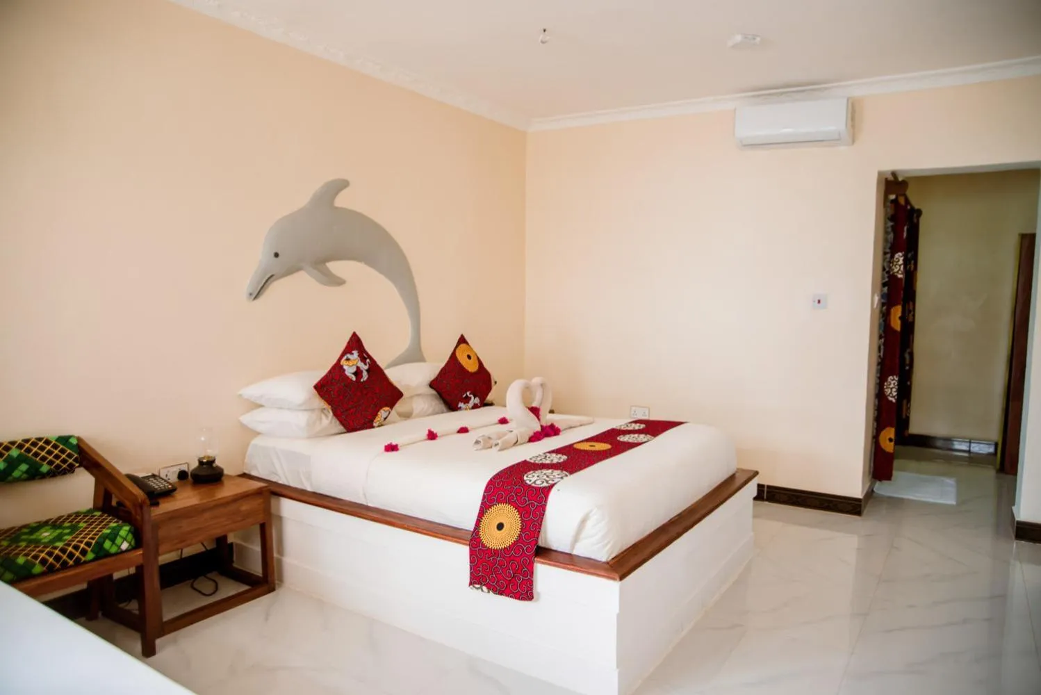 Bed in Double A Nungwi Beach Hotel