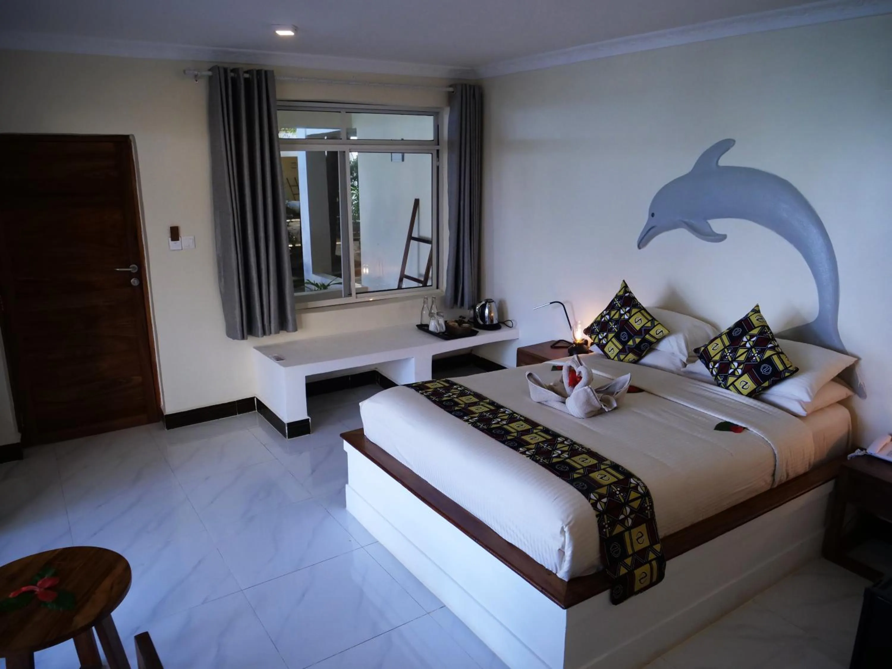 Bed in Double A Nungwi Beach Hotel