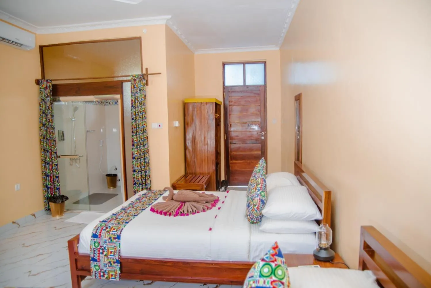 Bed in Double A Nungwi Beach Hotel