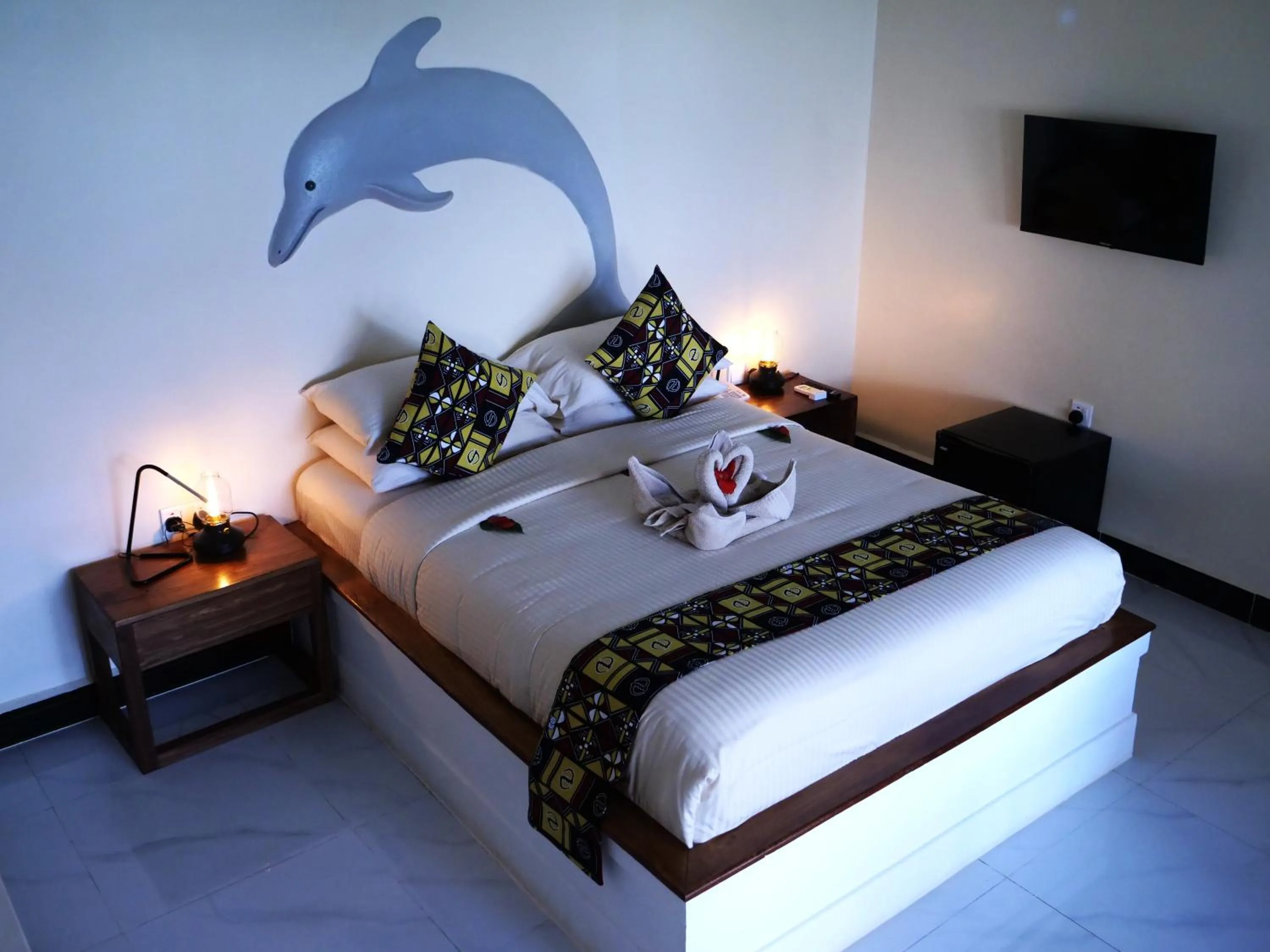 Bed in Double A Nungwi Beach Hotel