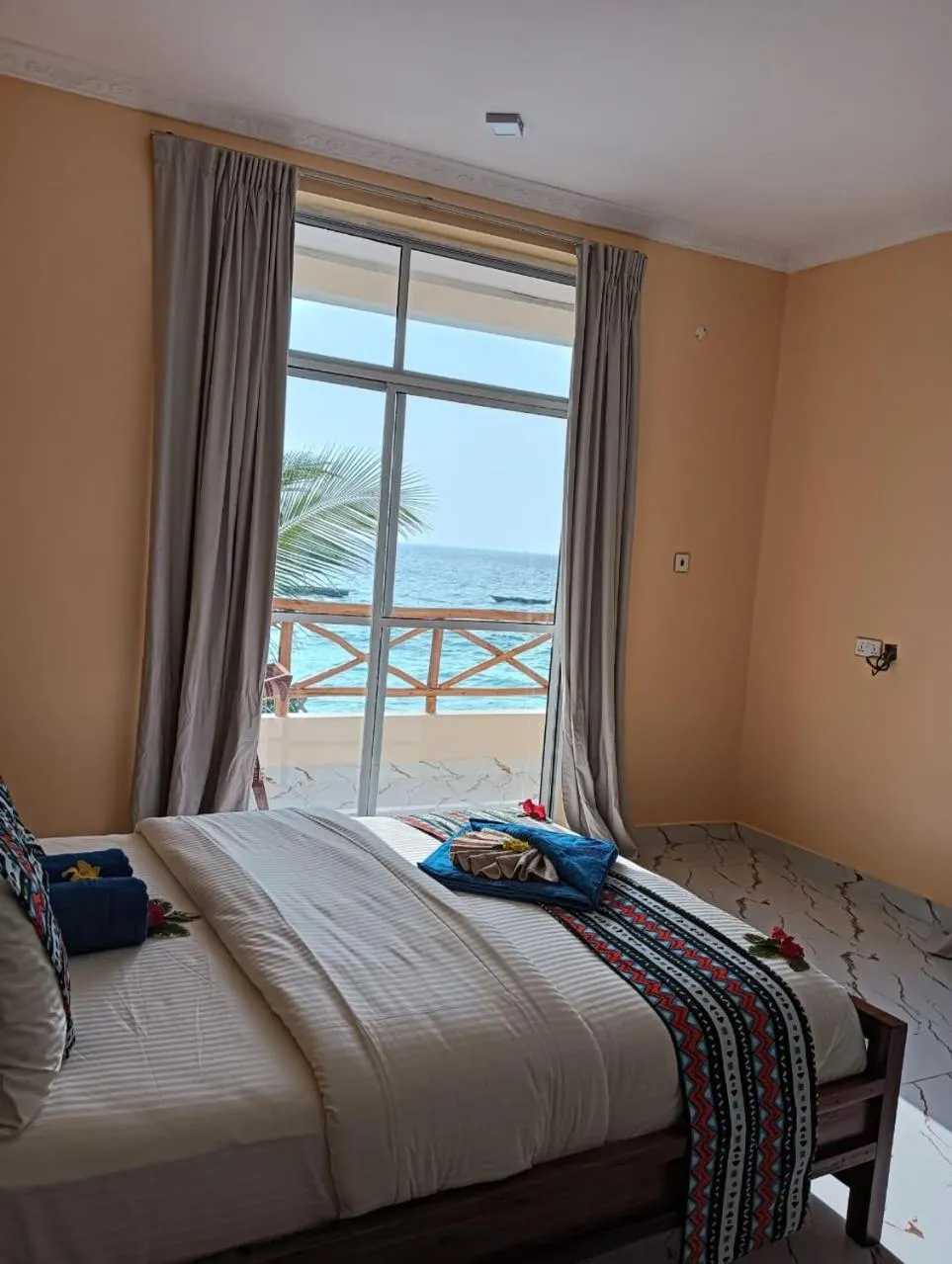 Bed in Double A Nungwi Beach Hotel