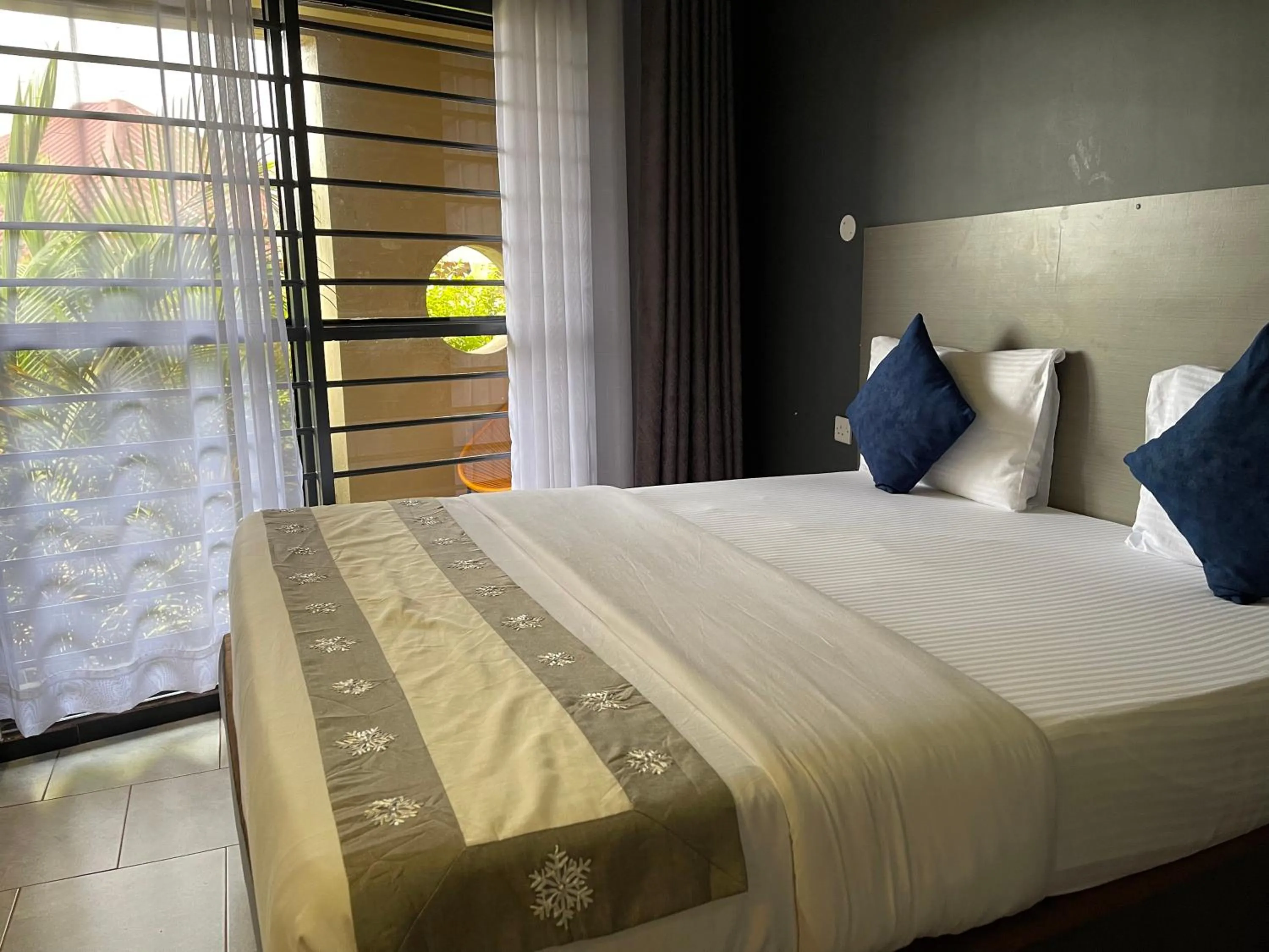 Bed in Ashleys Hotel