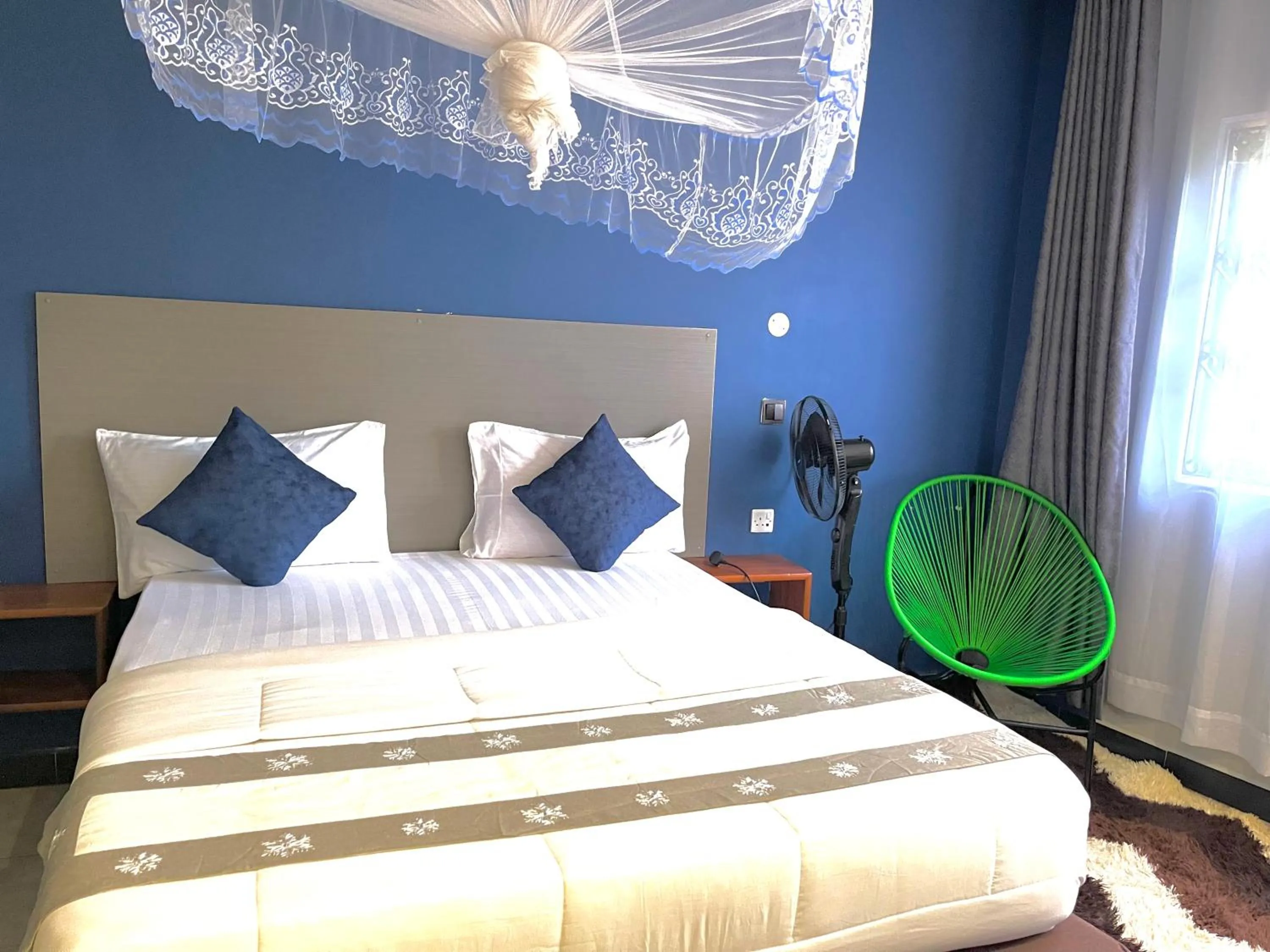 Bed in Ashleys Hotel