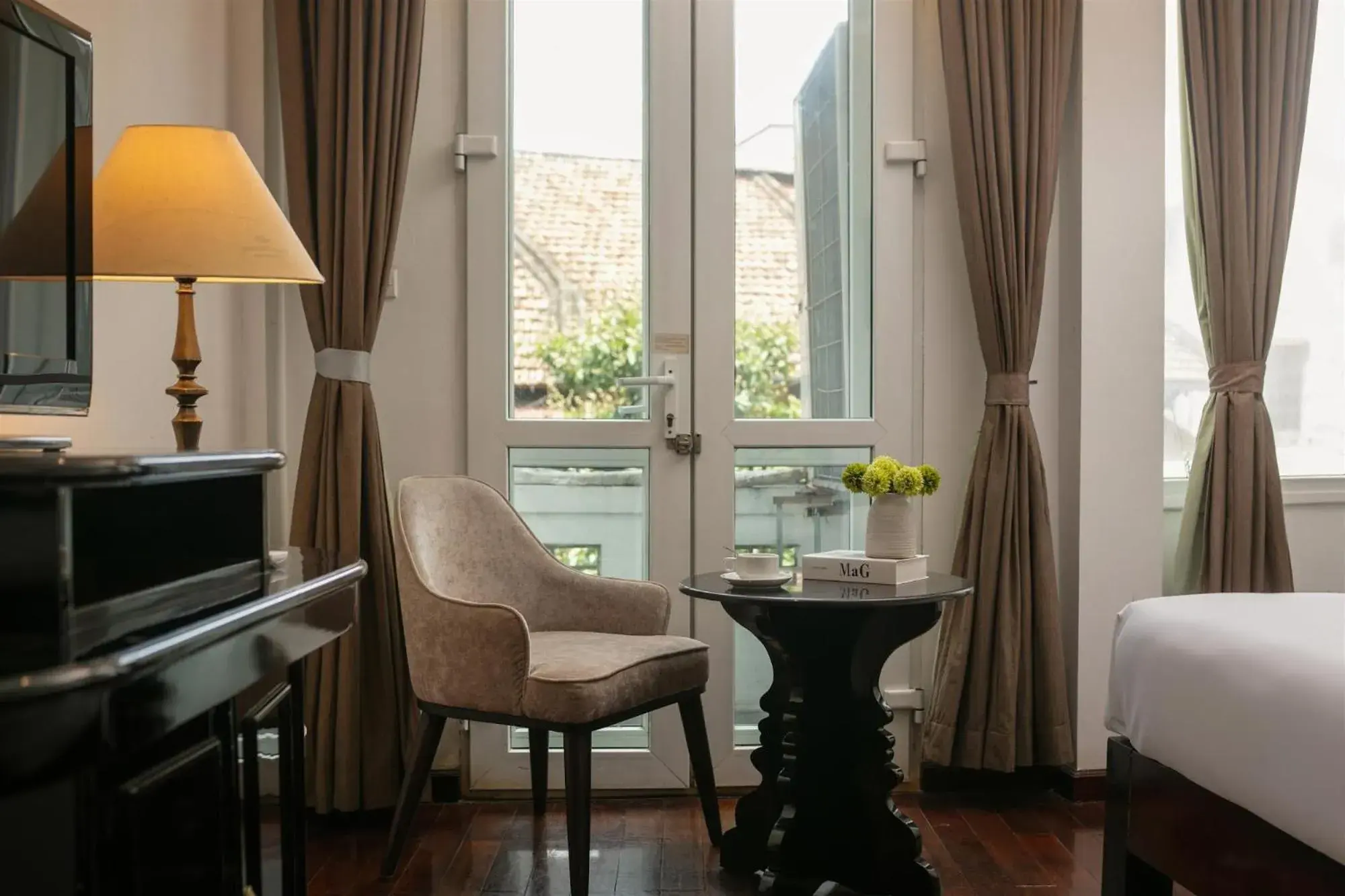Deluxe Double Room with Balcony in Hanoi Traveller House Deluxe Double Room with Balcony in Hanoi Traveller House