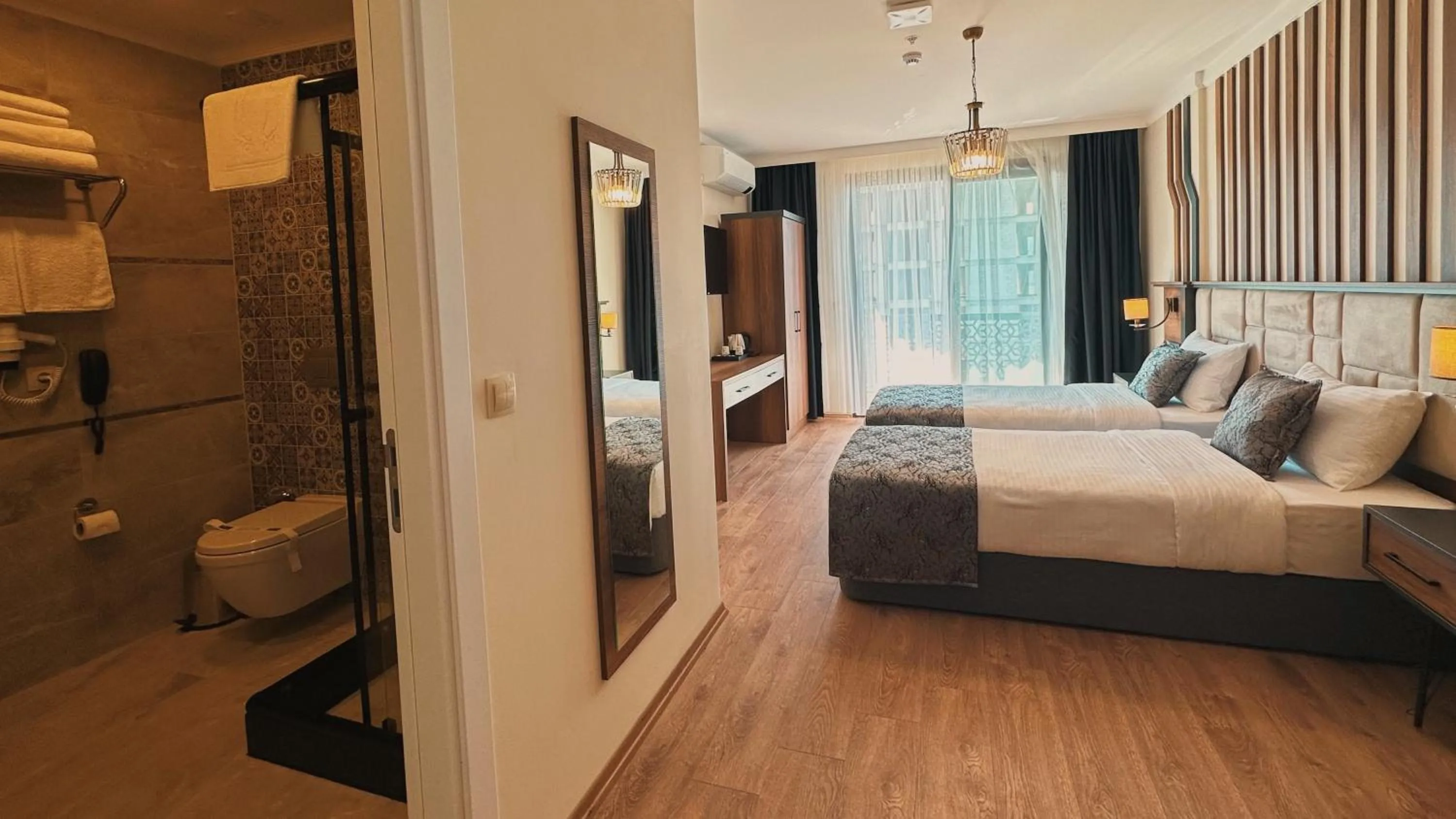 Bed in BİLİRİS HOTEL