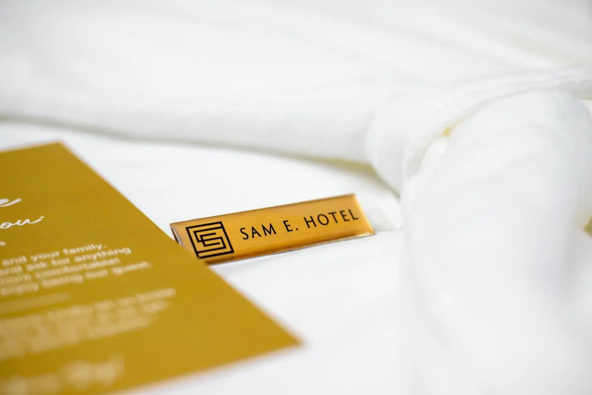 Bed in SAM E Hotel Bangkok Sathorn Bed in SAM E Hotel Bangkok Sathorn