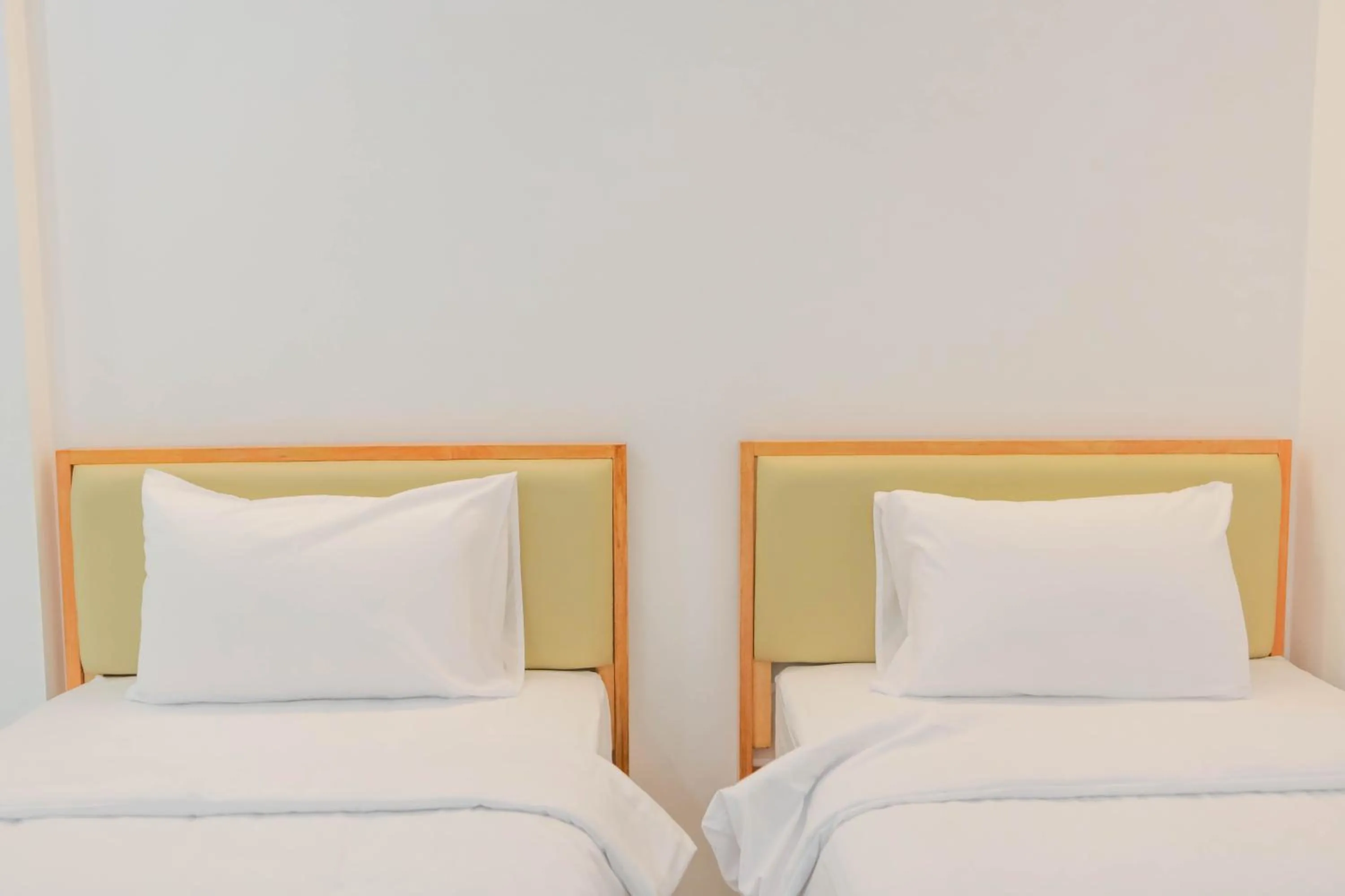 Bed in S1 Trang Hotel