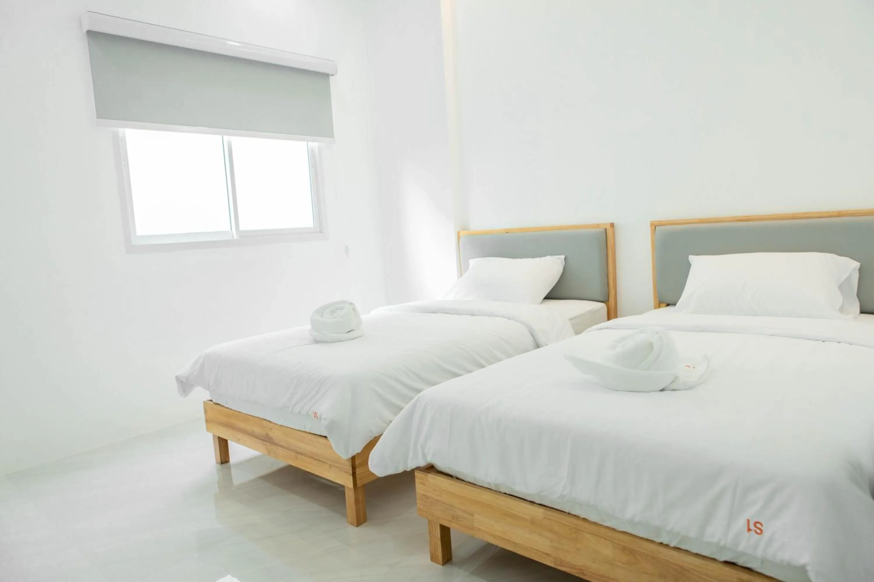 Bed in S1 Trang Hotel