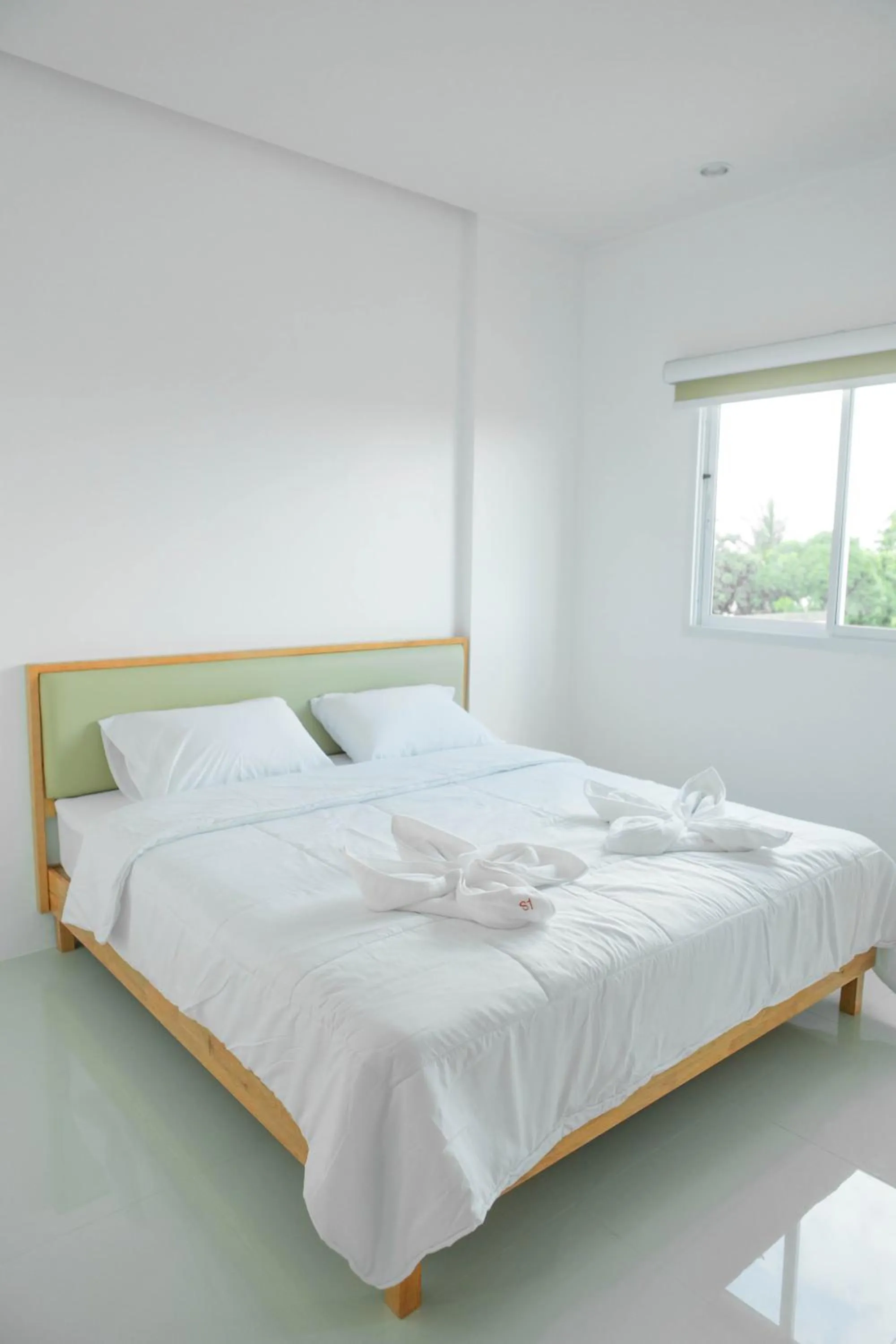 Bed in S1 Trang Hotel