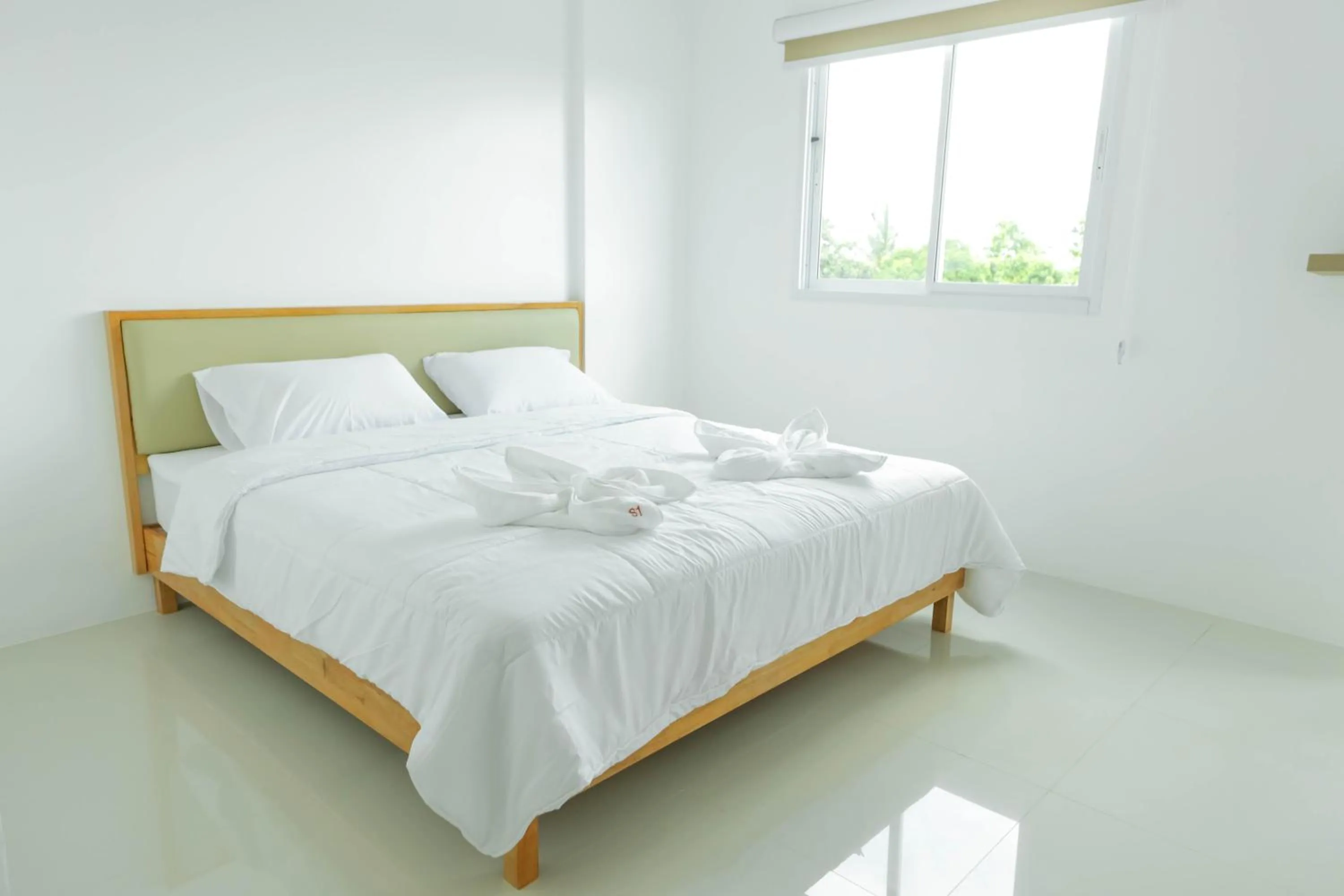 Bed in S1 Trang Hotel