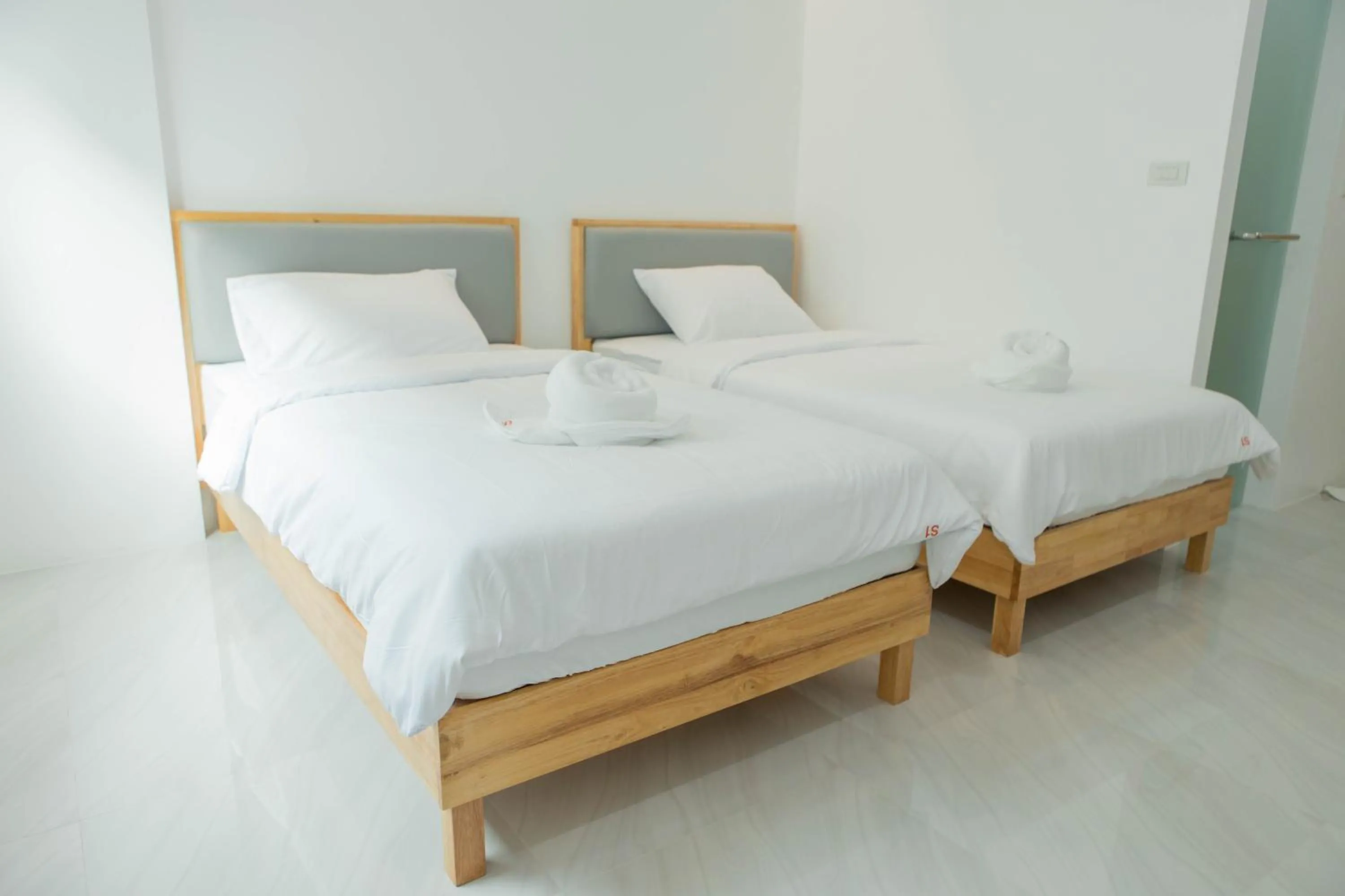 Bed in S1 Trang Hotel