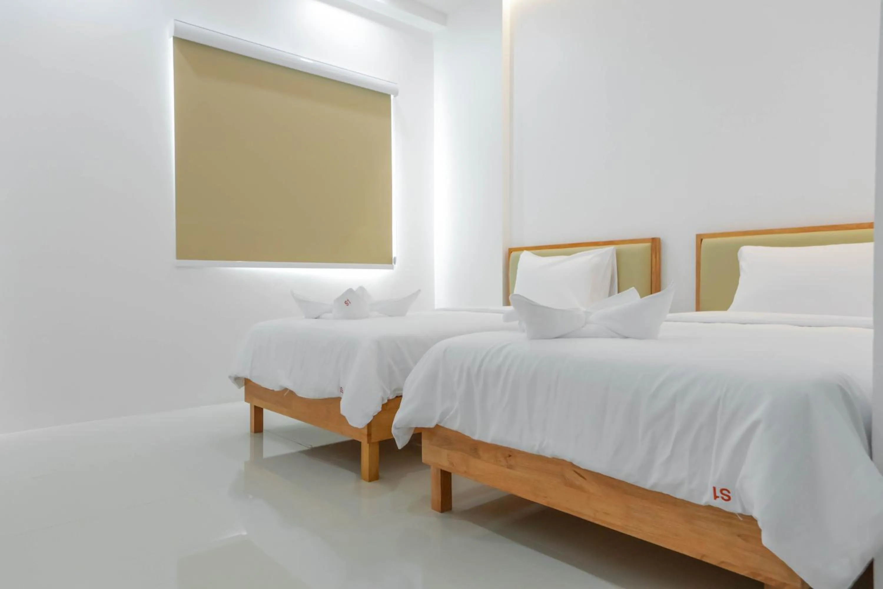 Bed in S1 Trang Hotel