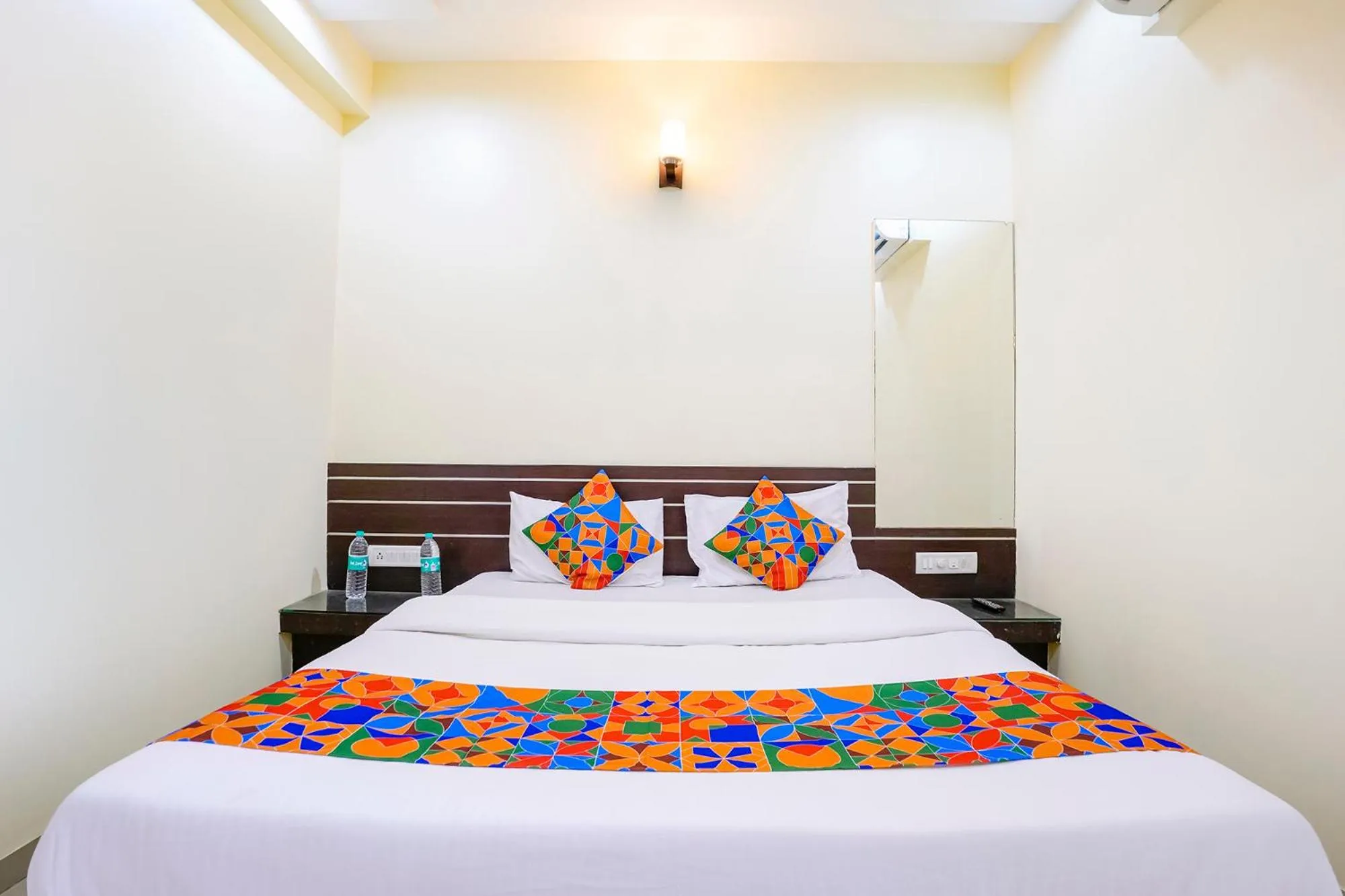Bed in FabHotel Sai Govind