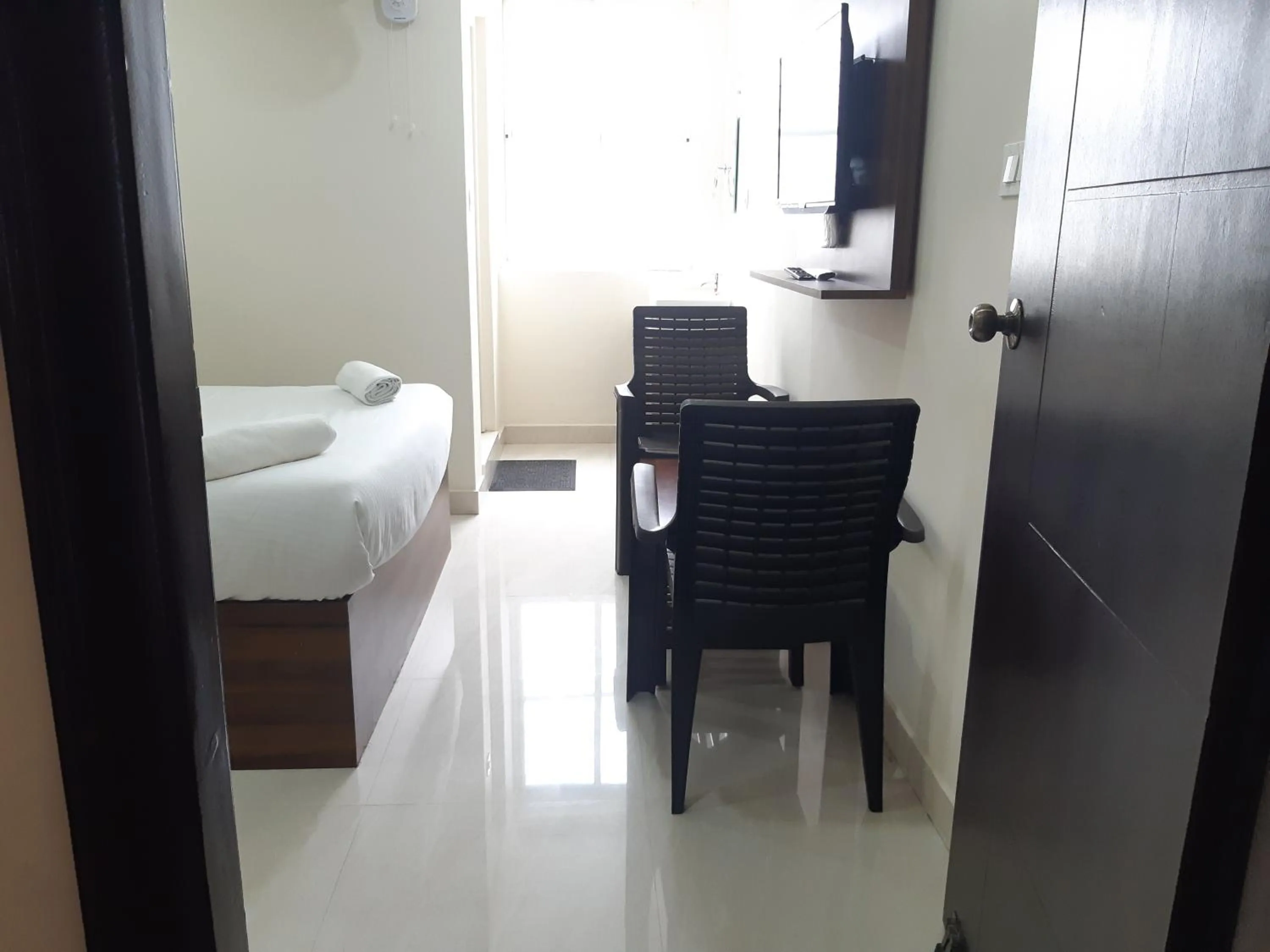 Seating area, Bed in CNR Residency, Madanapalle
