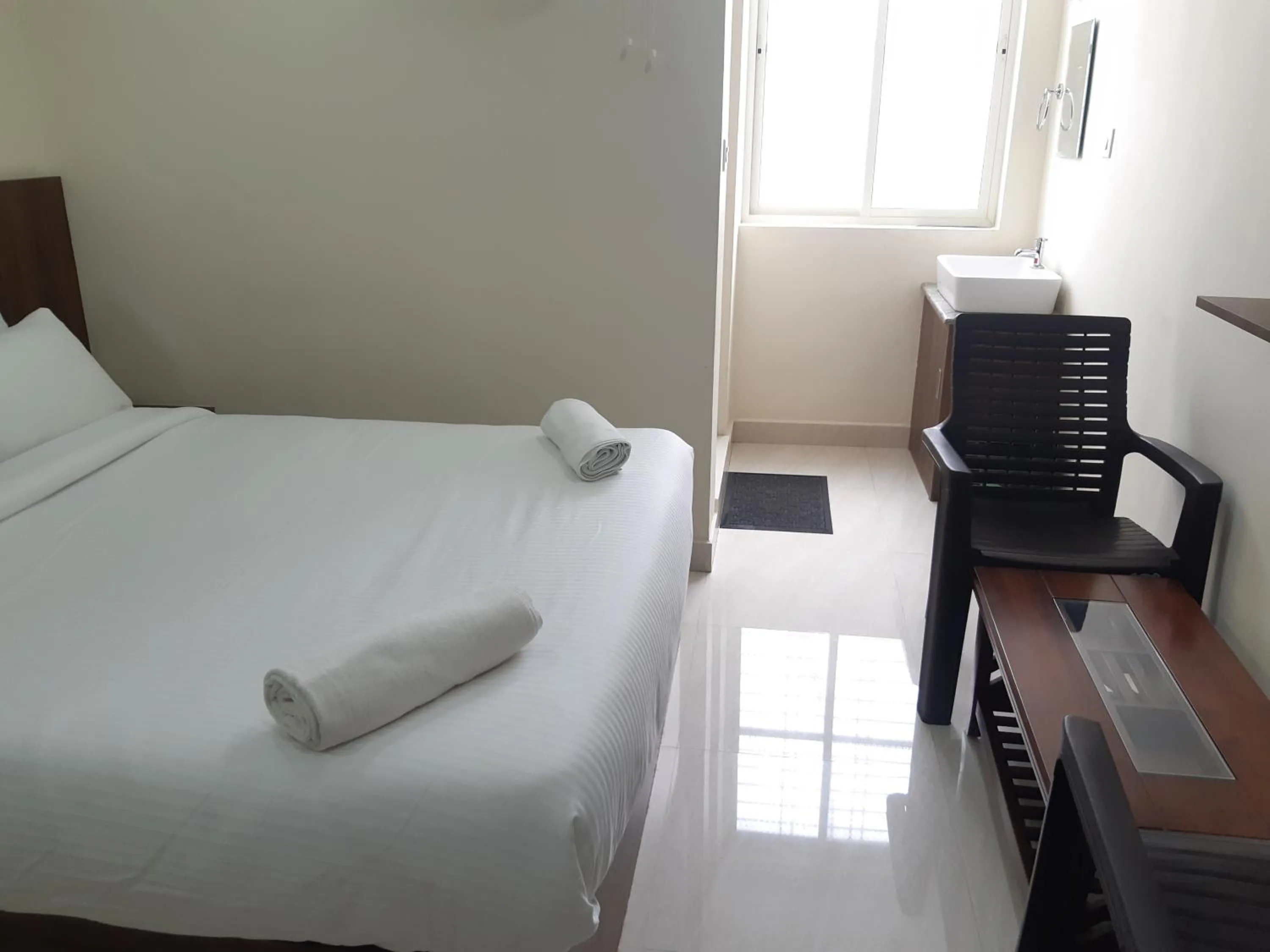 Photo of the whole room, Bed in CNR Residency, Madanapalle