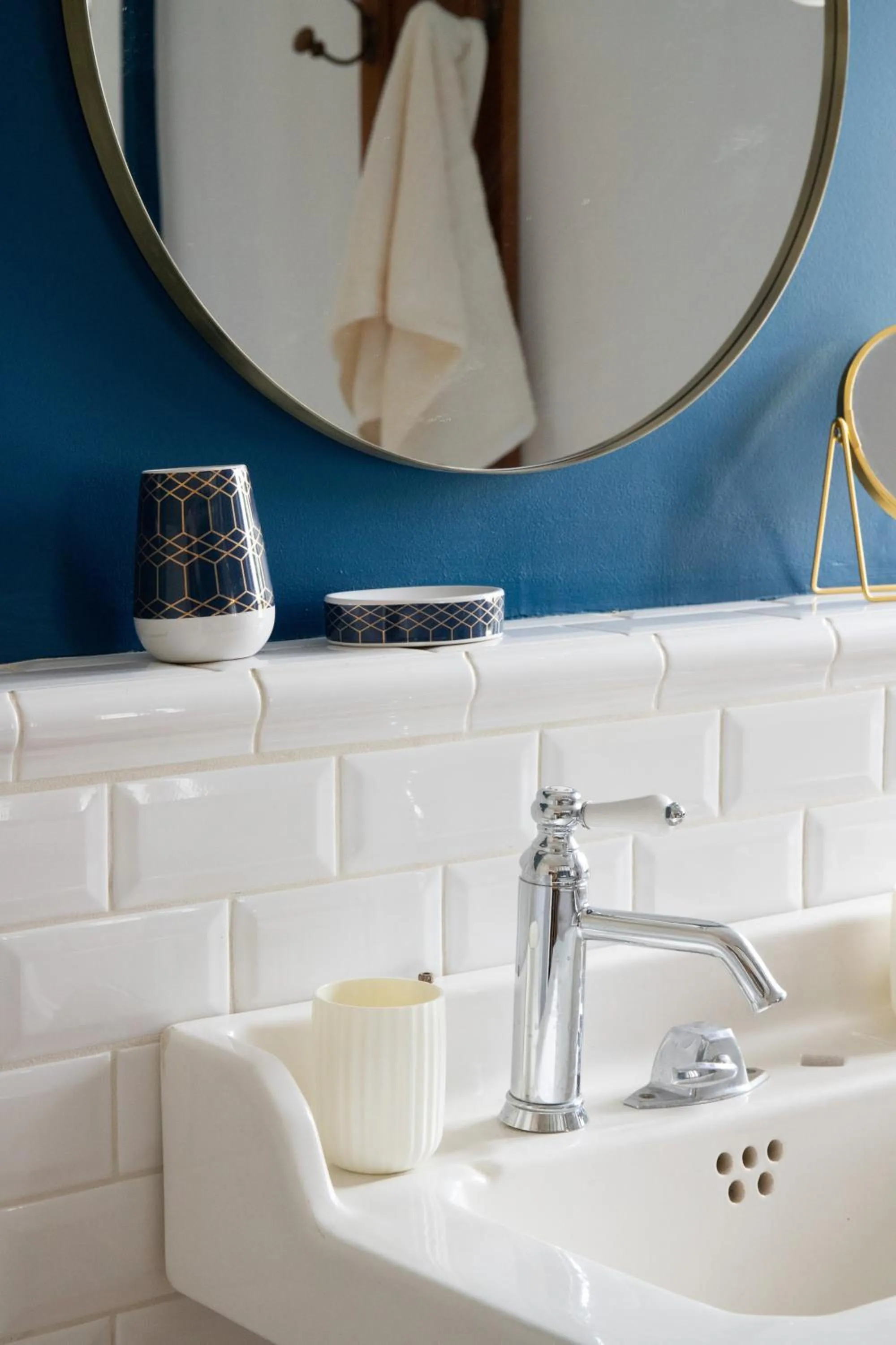 Bathroom in Maison et table d'hôtes Le Camélia Blanc