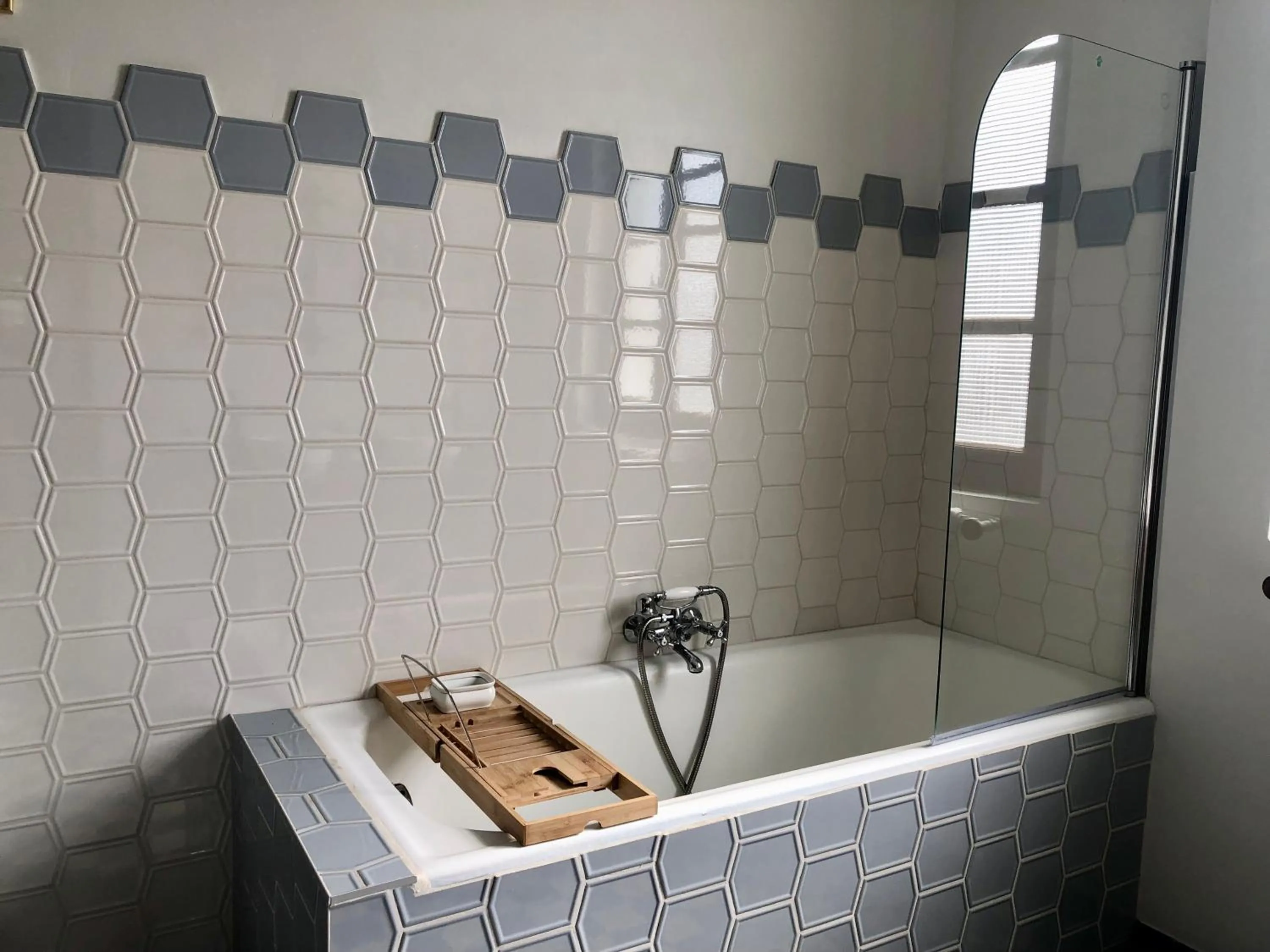 Bathroom in Maison et table d'hôtes Le Camélia Blanc