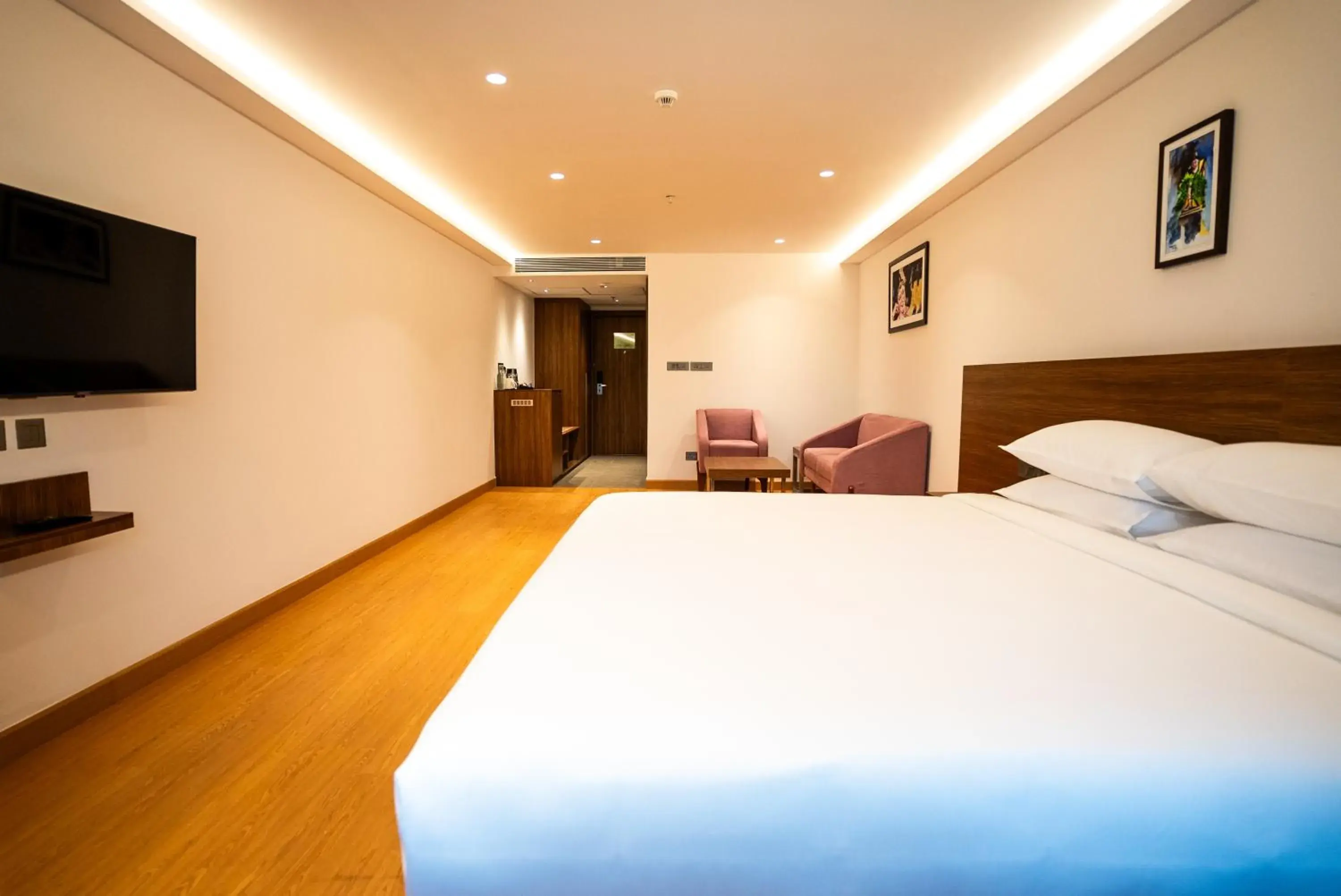 Bed in Lilac Hotel Guruvayur Bed in Lilac Hotel Guruvayur