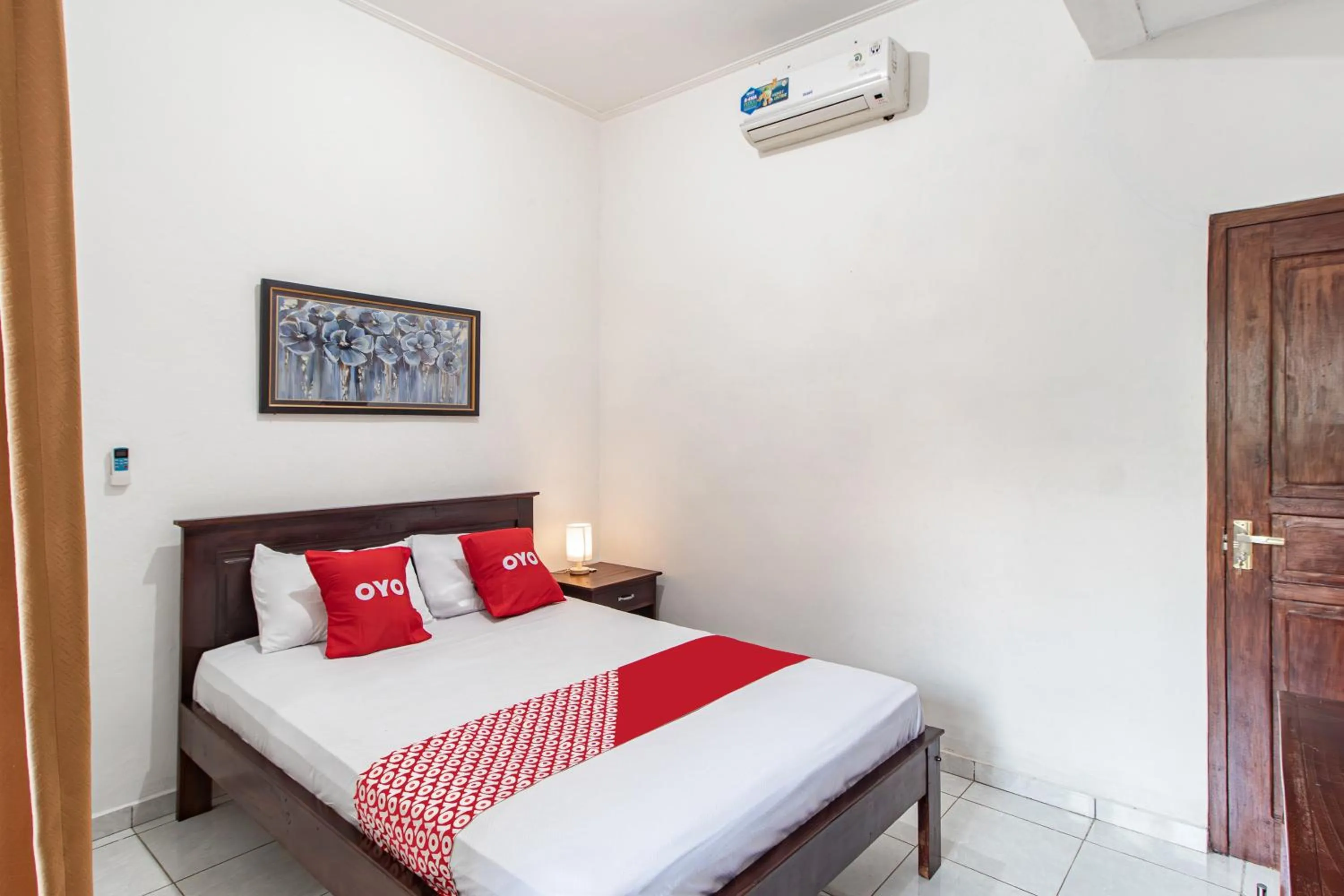 Bedroom in OYO 93482 Penginapan Tenang Lovina