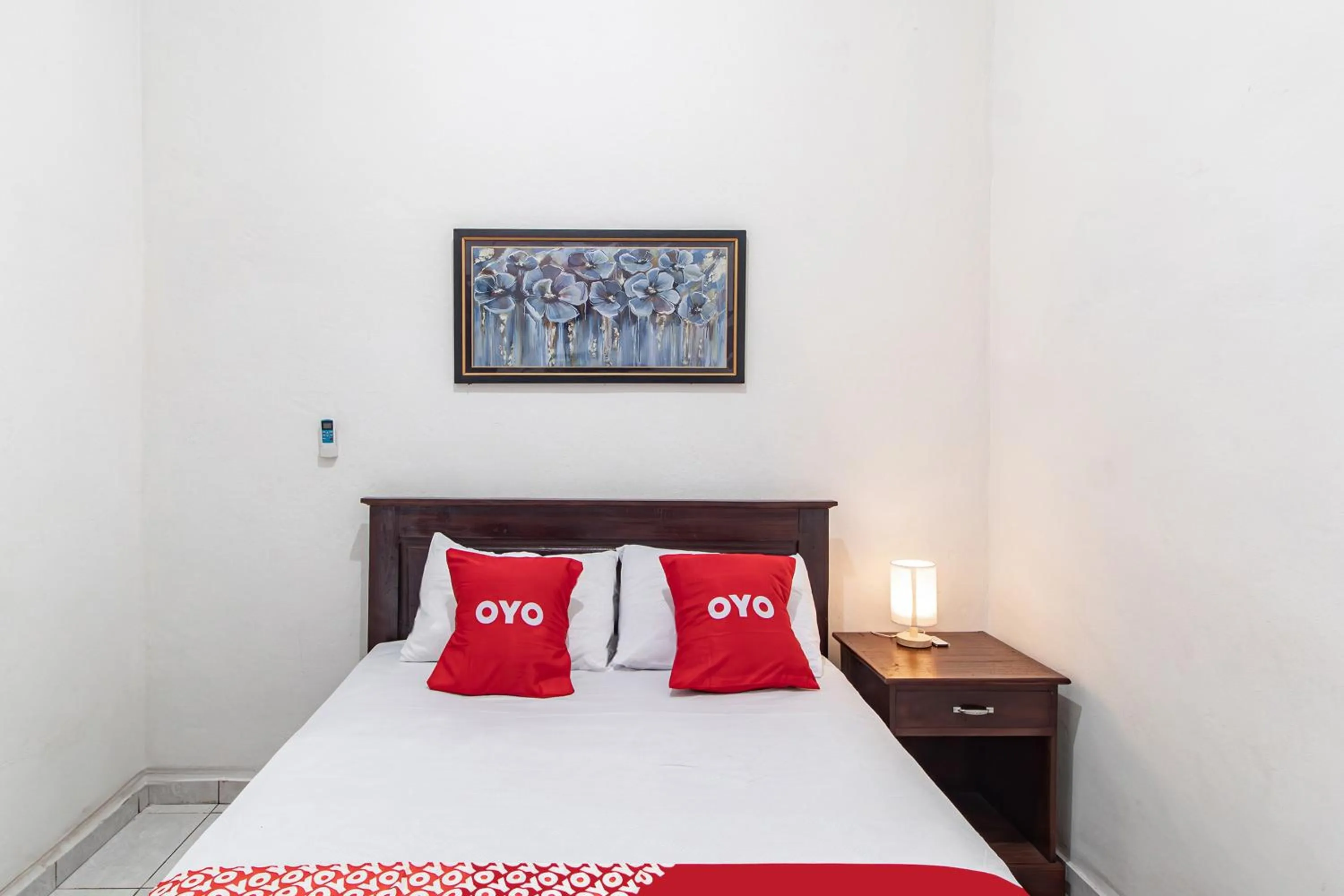 Bedroom in OYO 93482 Penginapan Tenang Lovina