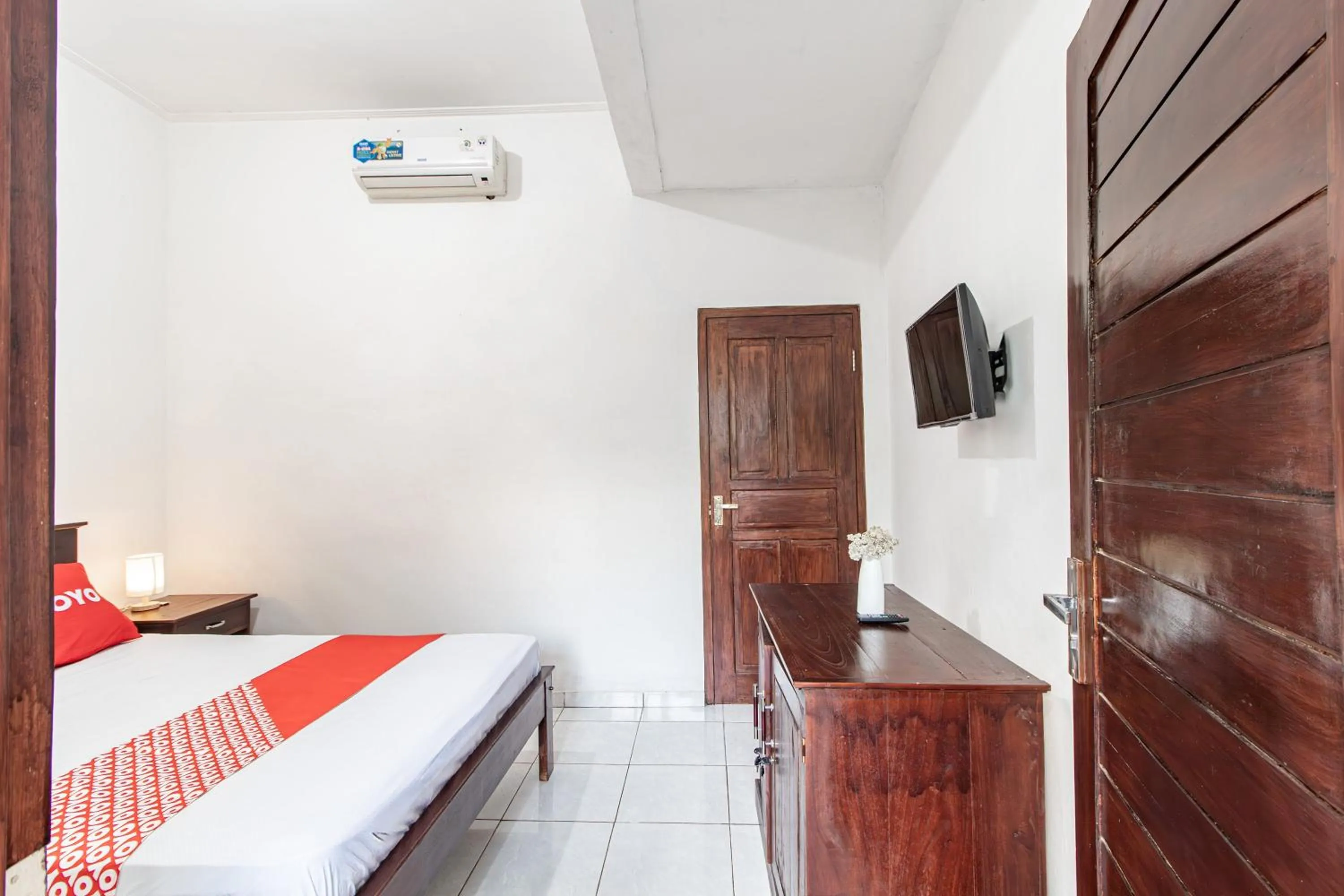 Bedroom in OYO 93482 Penginapan Tenang Lovina