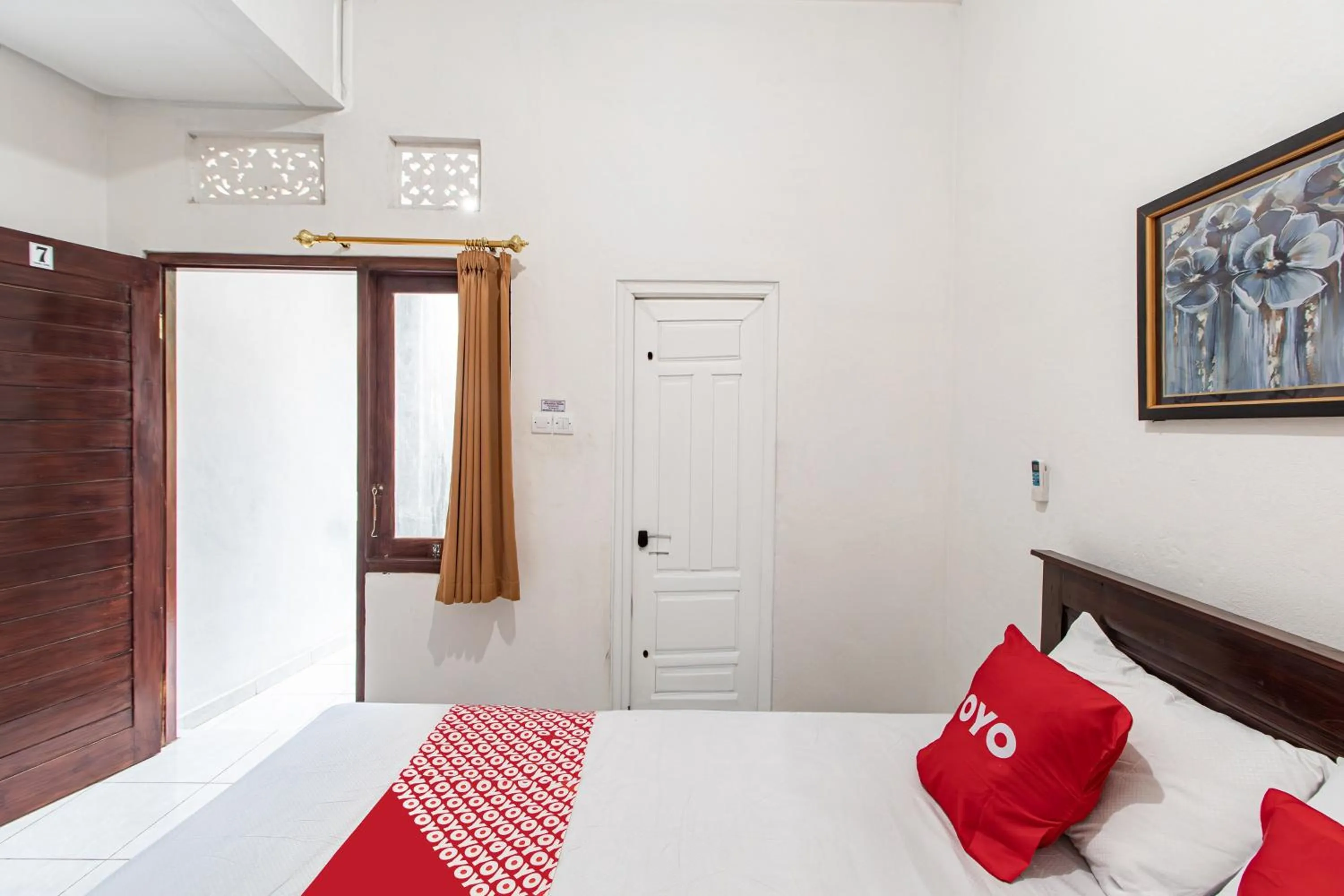 Bedroom in OYO 93482 Penginapan Tenang Lovina